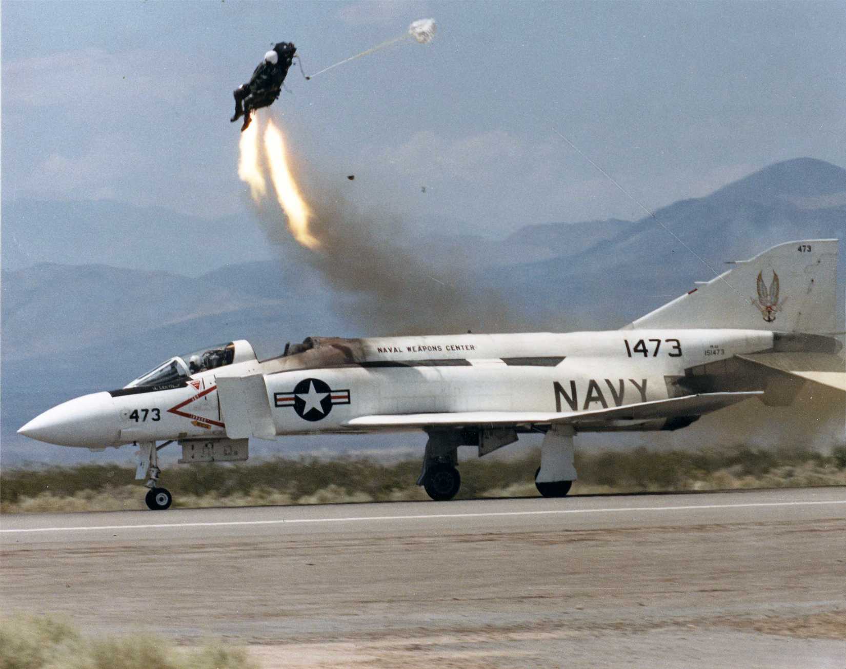 View of the NACES seat test using a McDonnell YF-4J Phantom II (BuNo 151473) at the U.S. Navy Naval Weapons Station China Lake, California (USA), in 1987. This aircraft had originally been delivered as a F-4B-19-MC (c/n 550). It was later converted to an YF-4J prototype, together with BuNos 151496 and 151497. It was later used as an ejection seat testbed at China Lake. As of 2012, it is on display at the main gate at China Lake.