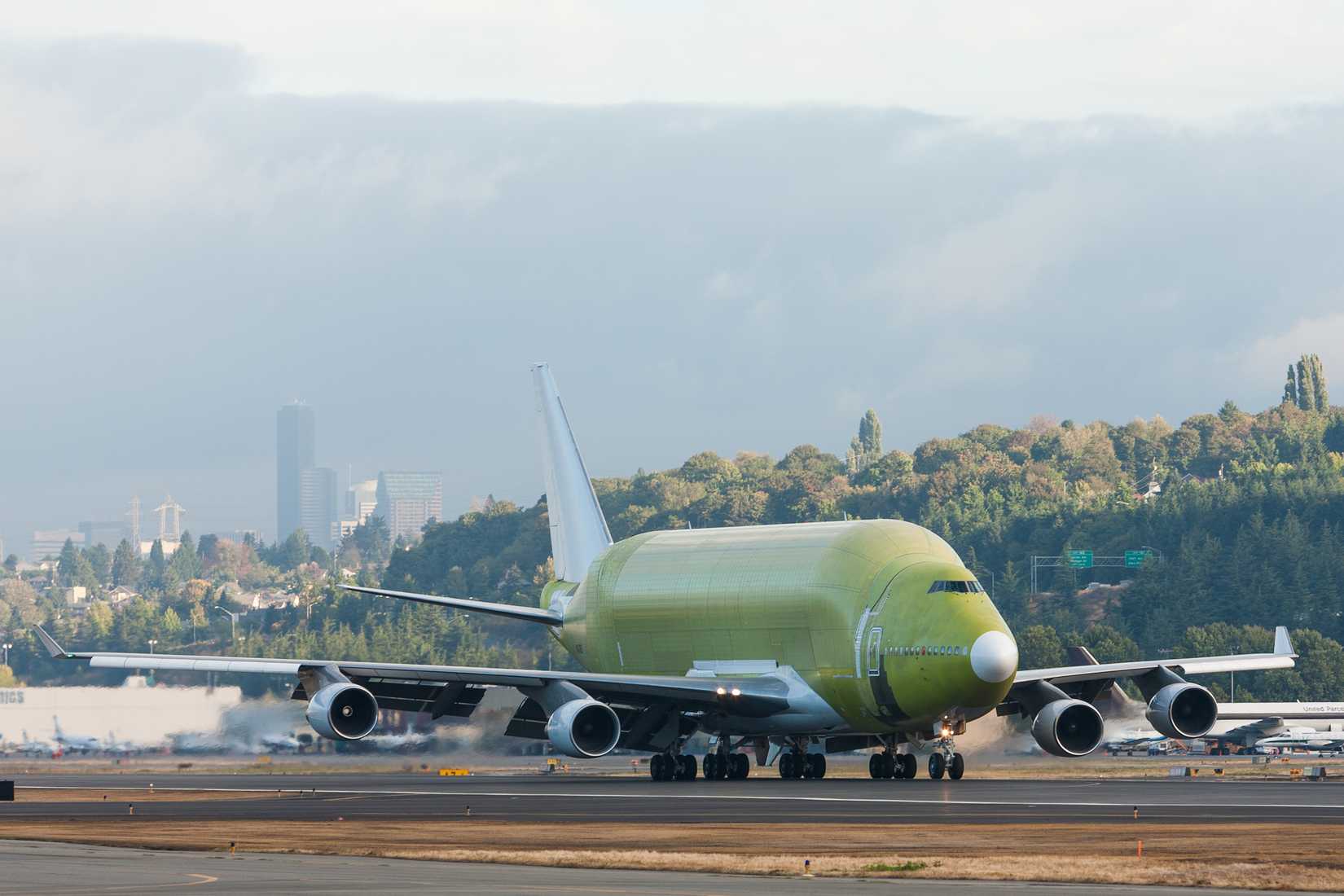 First specially built DreamLifter, a modified Boeing 747-400, touches down at Boeing Field (BFI) after flight testing