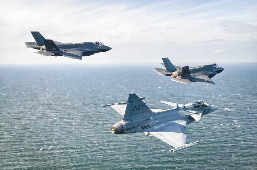 Two F-35 and Saab Gripen over the Baltic Sea