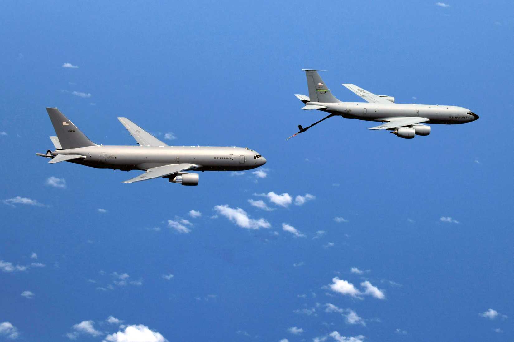 KC-135 Stratotankers rendezvous with a KC-46A Pegasus