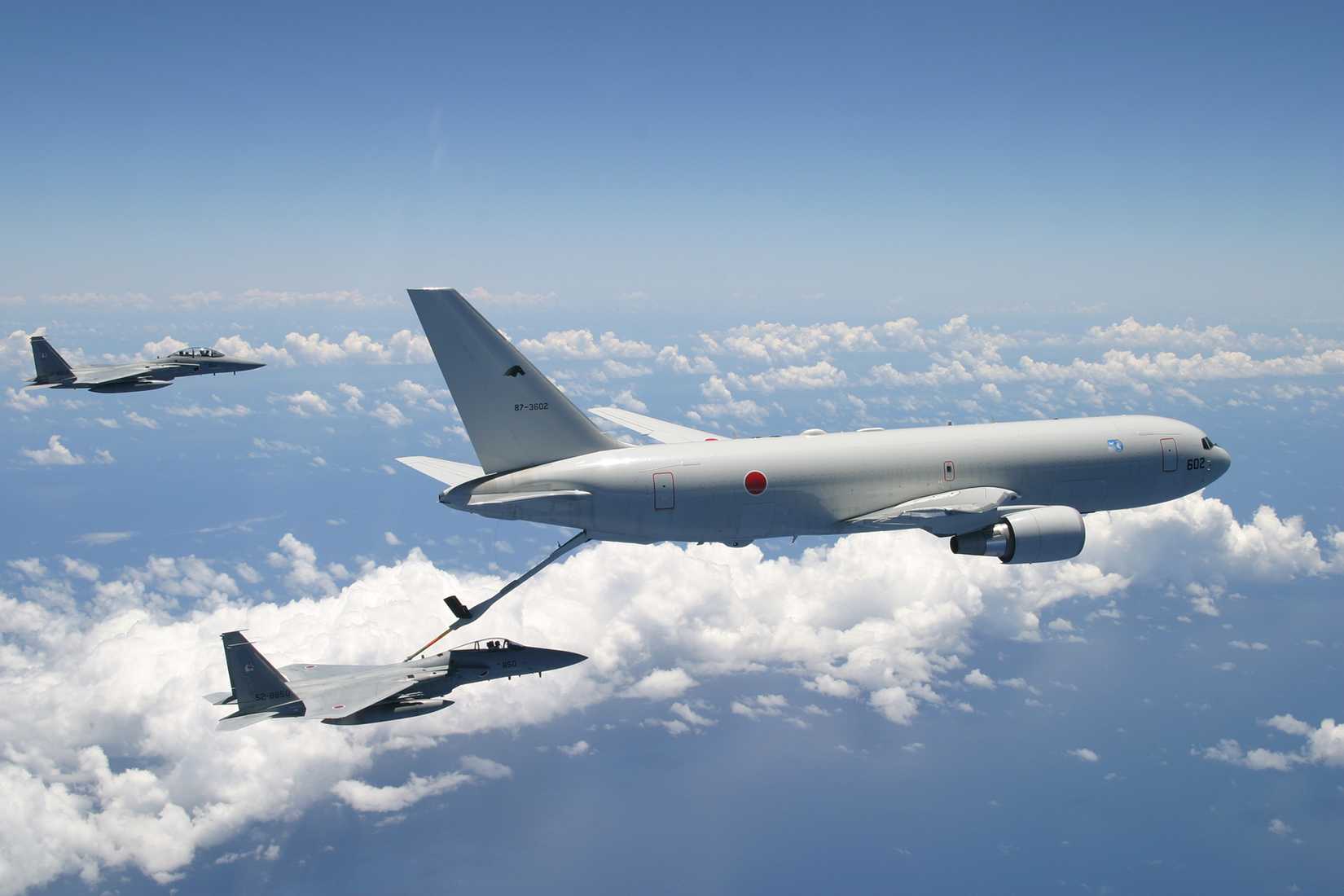 KC-767 Of Japan Air Force with two F-15