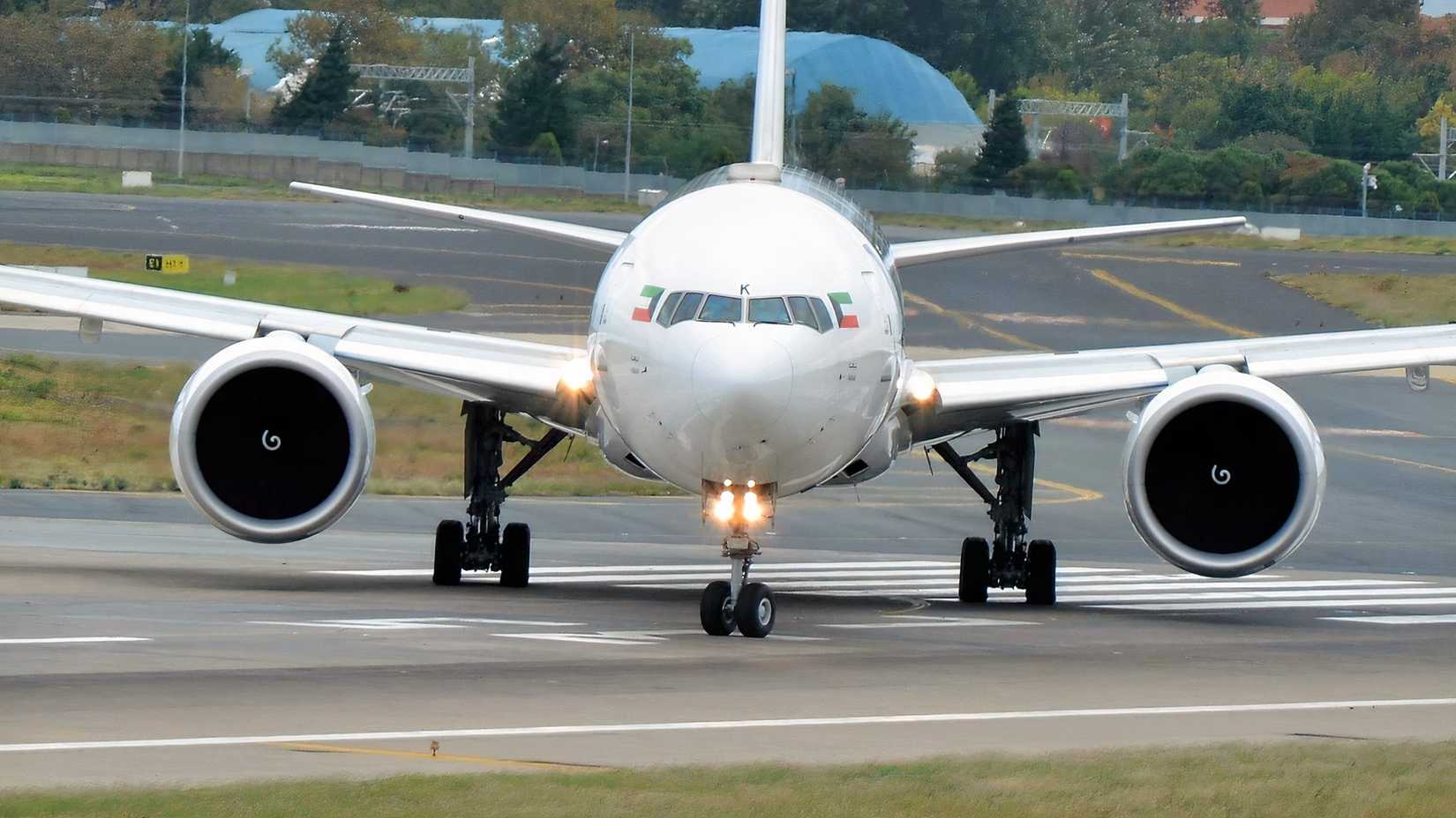 Kuwait Airways Boeing 777-300ER turning onto runway