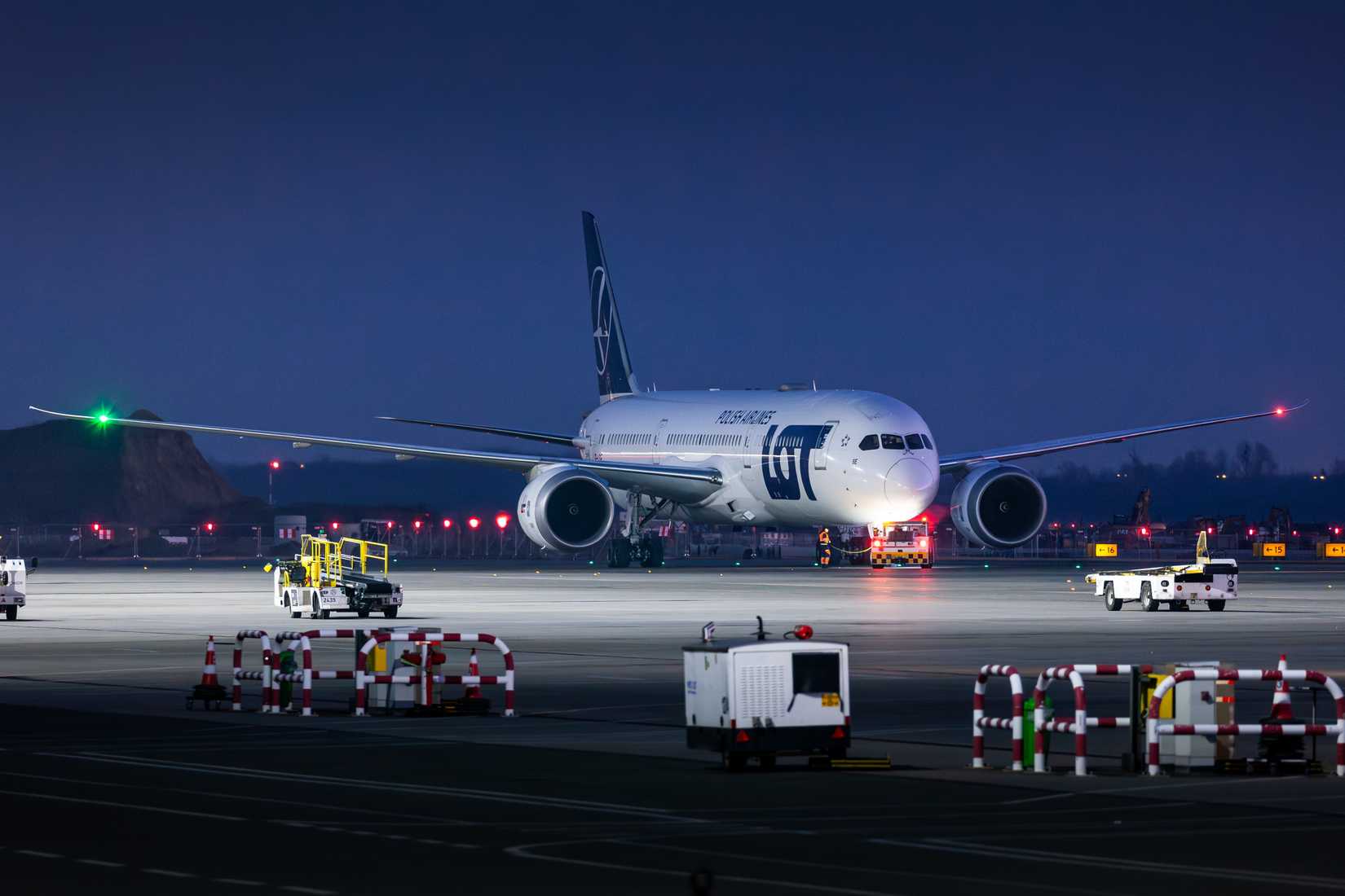 LOT Polish Airlines Boeing 787-9 push back at Wroclaw Airport.