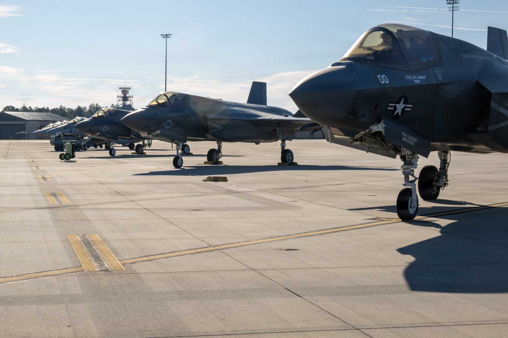 Marine Corps F-35B Lightning II and F-18CD Hornet parked on the flightline at Moody Air Force Base, 2026.