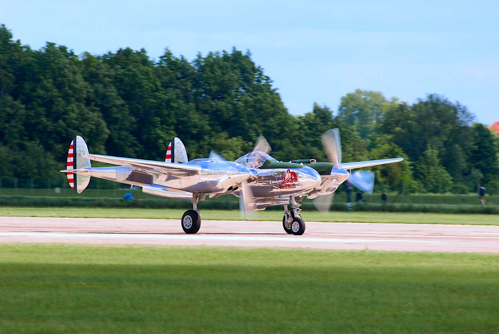 p38 of The Flying Bulls landing at Pardubice Airport (LKPD) for Pardubice Aviation Fair 2022