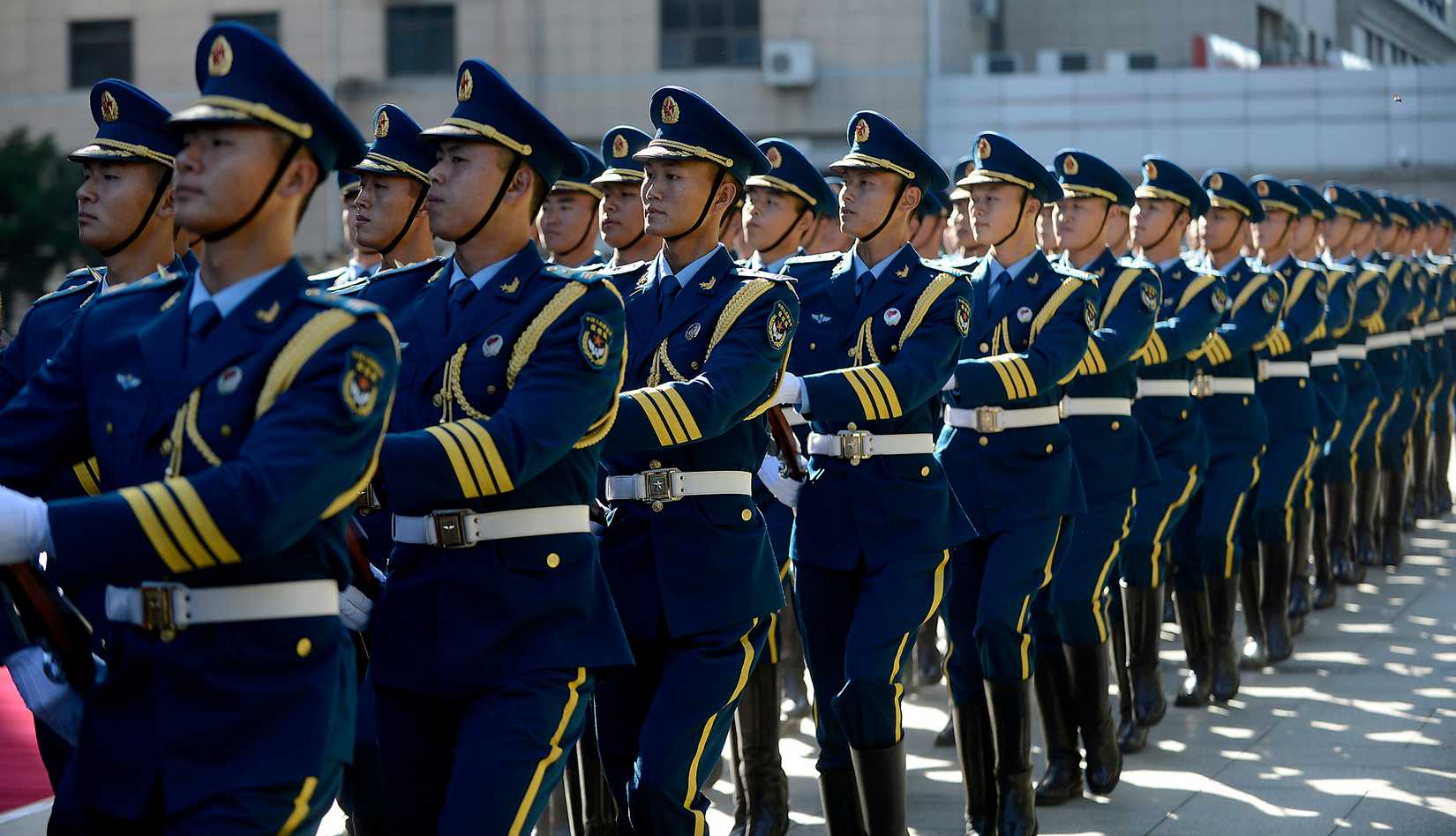 People's Liberation Army Air Force members march during a welcome ceremony in honor of Air Force Chief of Staff Gen. Mark A. Welsh III.