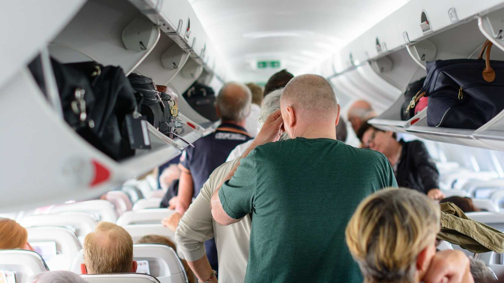 Passengers disembarking a plane