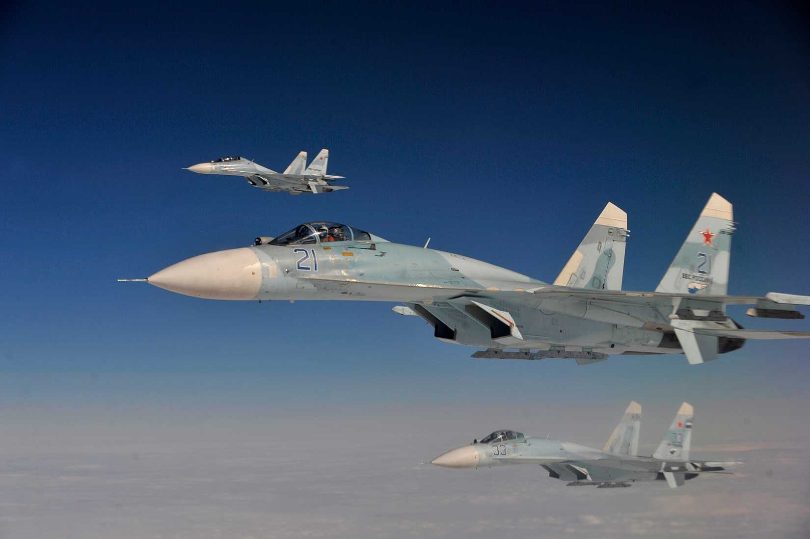 Russian Federation Air Force Su-27 Sukhois intercept a simulated hijacked aircraft entering Russian airspace