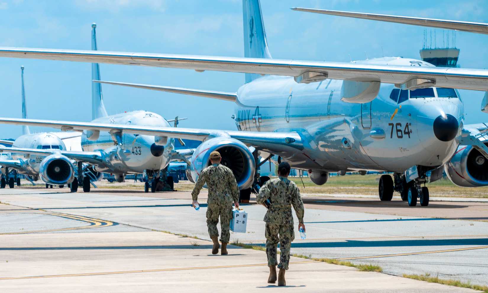 Sailors at Naval Air Station (NAS) Joint Reserve Base (JRB) prepare Navy P-8A aircraft.