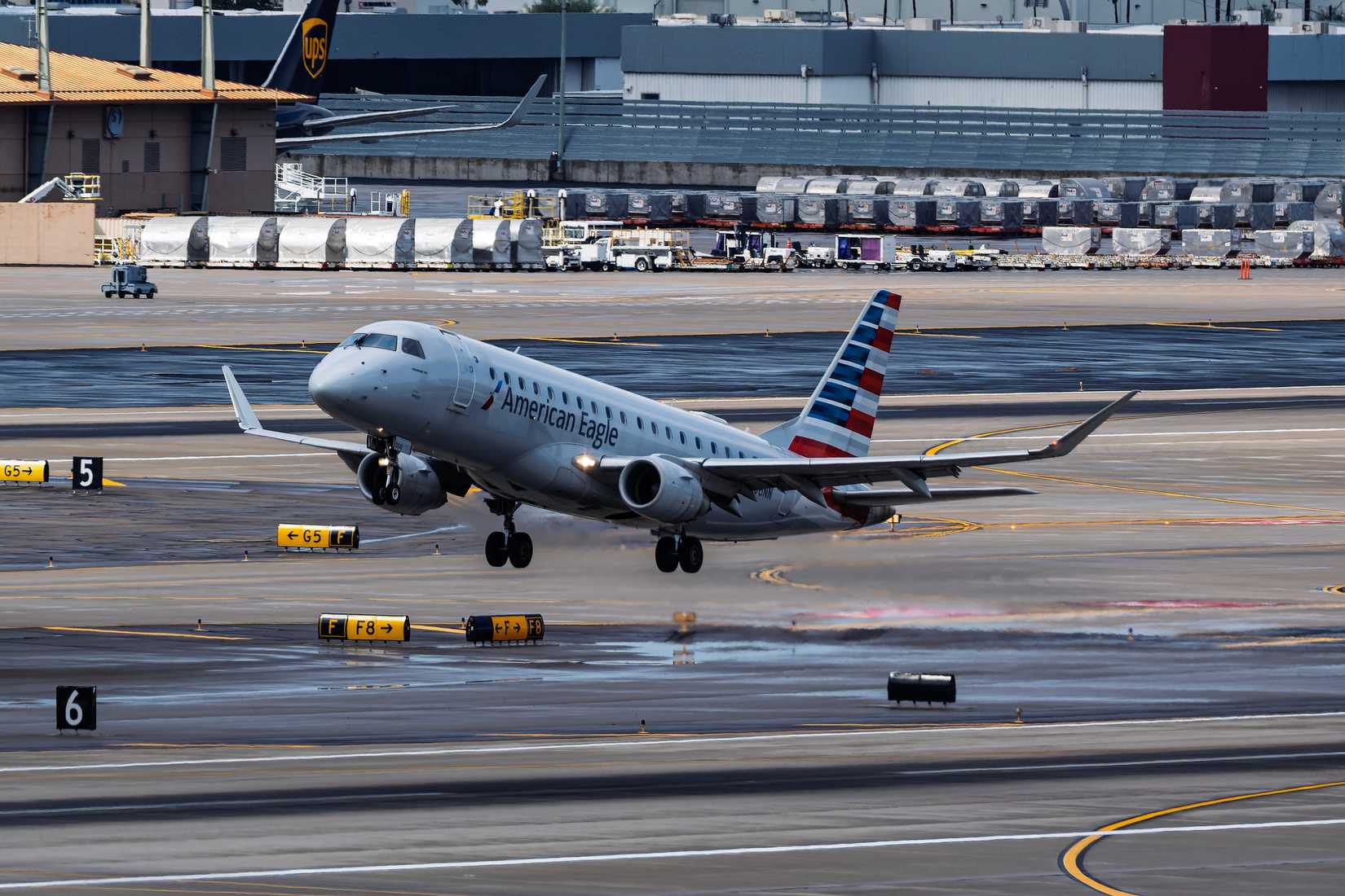American Eagle Embraer E-175 aircraft departing