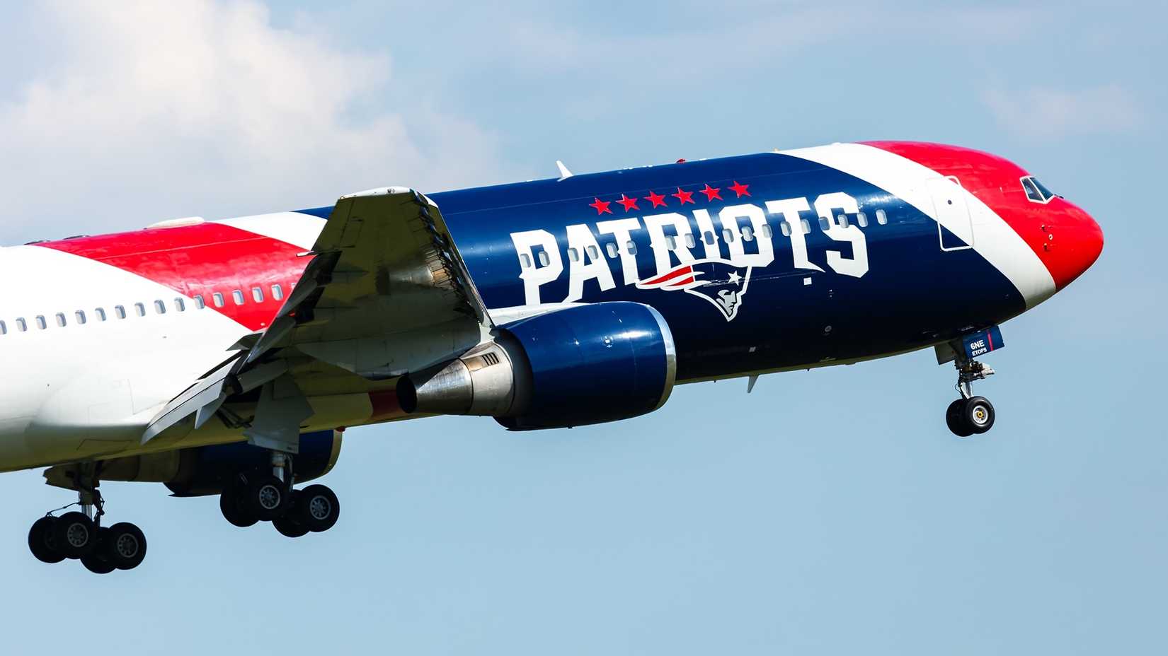 A "Patriots" Boeing 767 taking off