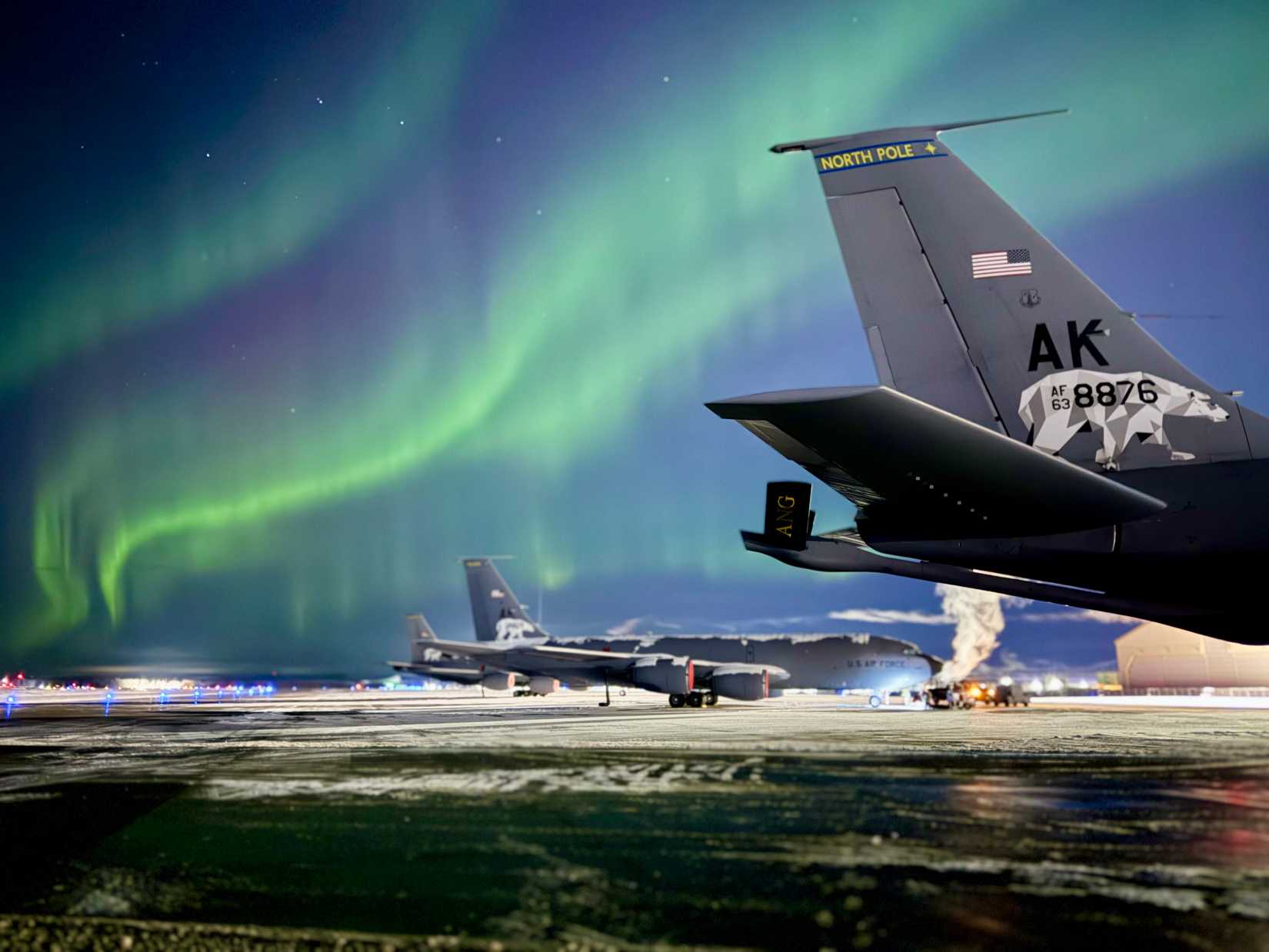 The Northern Lights dance above an Alaska Air National Guard 168th Wing KC-135 Stratotanker at Eielson Air Force Base, Alaska, Nov 12, 2025.