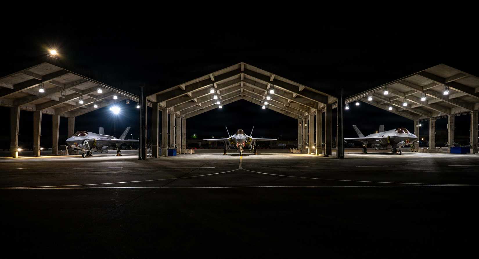 Three F-35A Lightning IIs assigned to the 4th Expeditionary Fighter Squadron, deployed to Kadena Air Base.