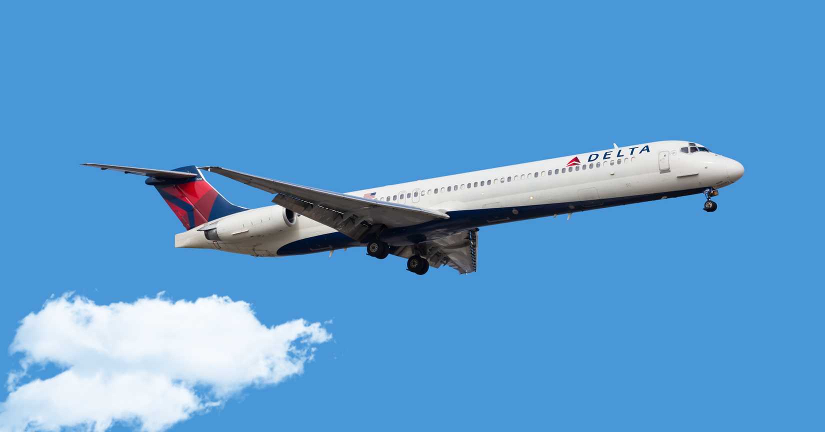A Delta Air Lines MD-80 aircraft landing at O'Hare International Airport.