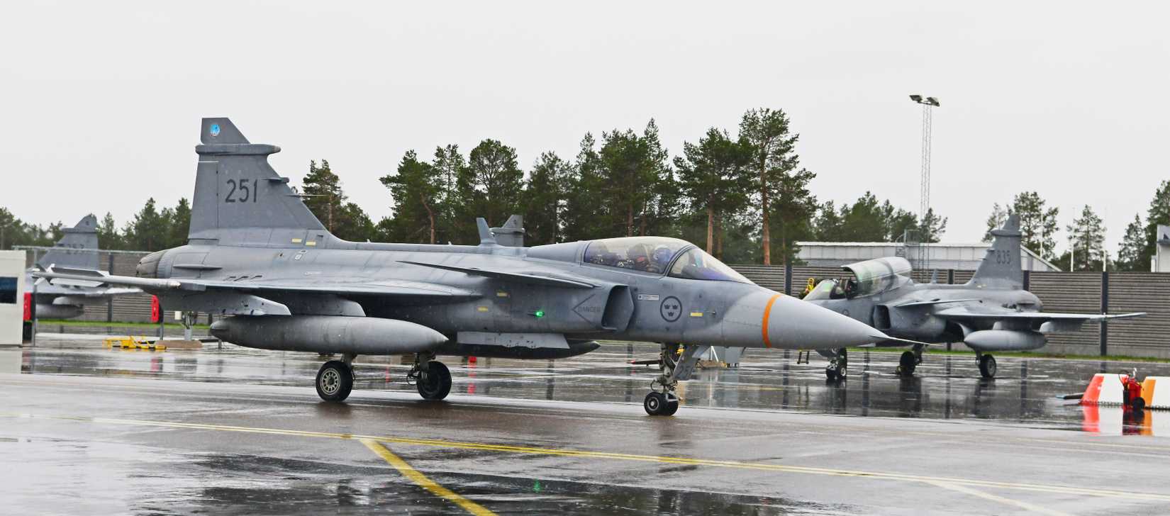 A Swedish Air Force JAS 39 Gripen taxies prior to flight operations during Arctic Challenge Exercise 2019.