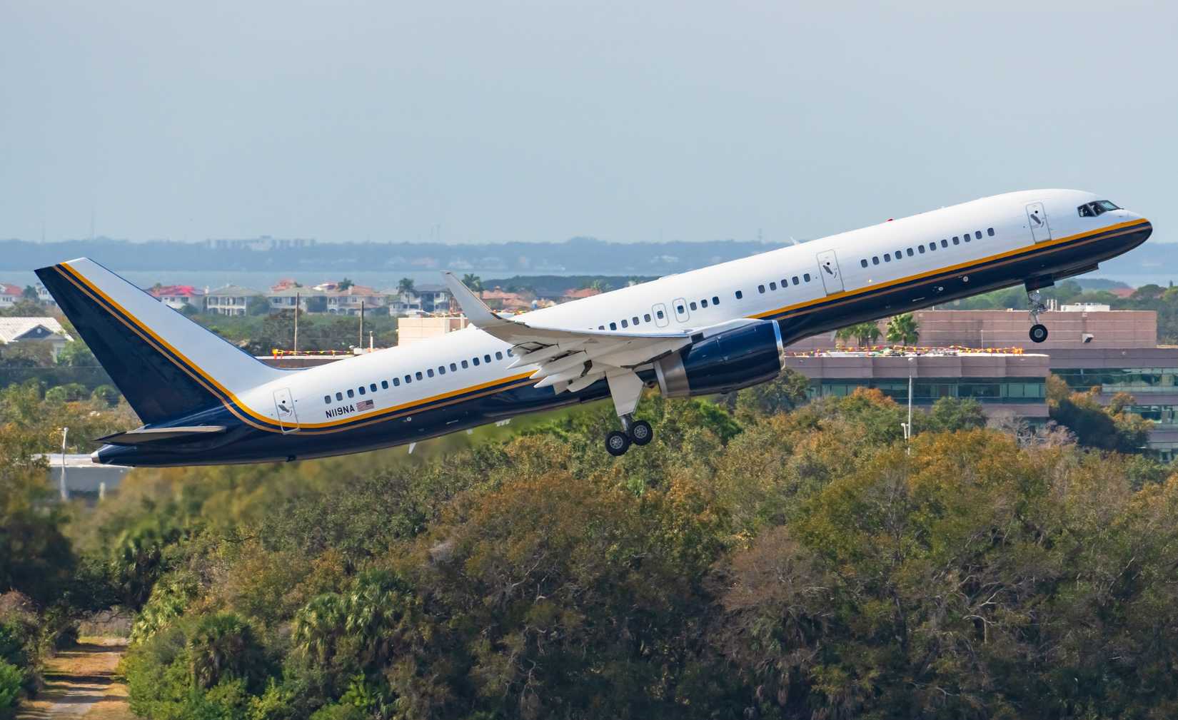 A US Department of Justice (DOJ) Boeing 757-200 airplane, N119NA, lifts of from Tampa International Airport (TPA)