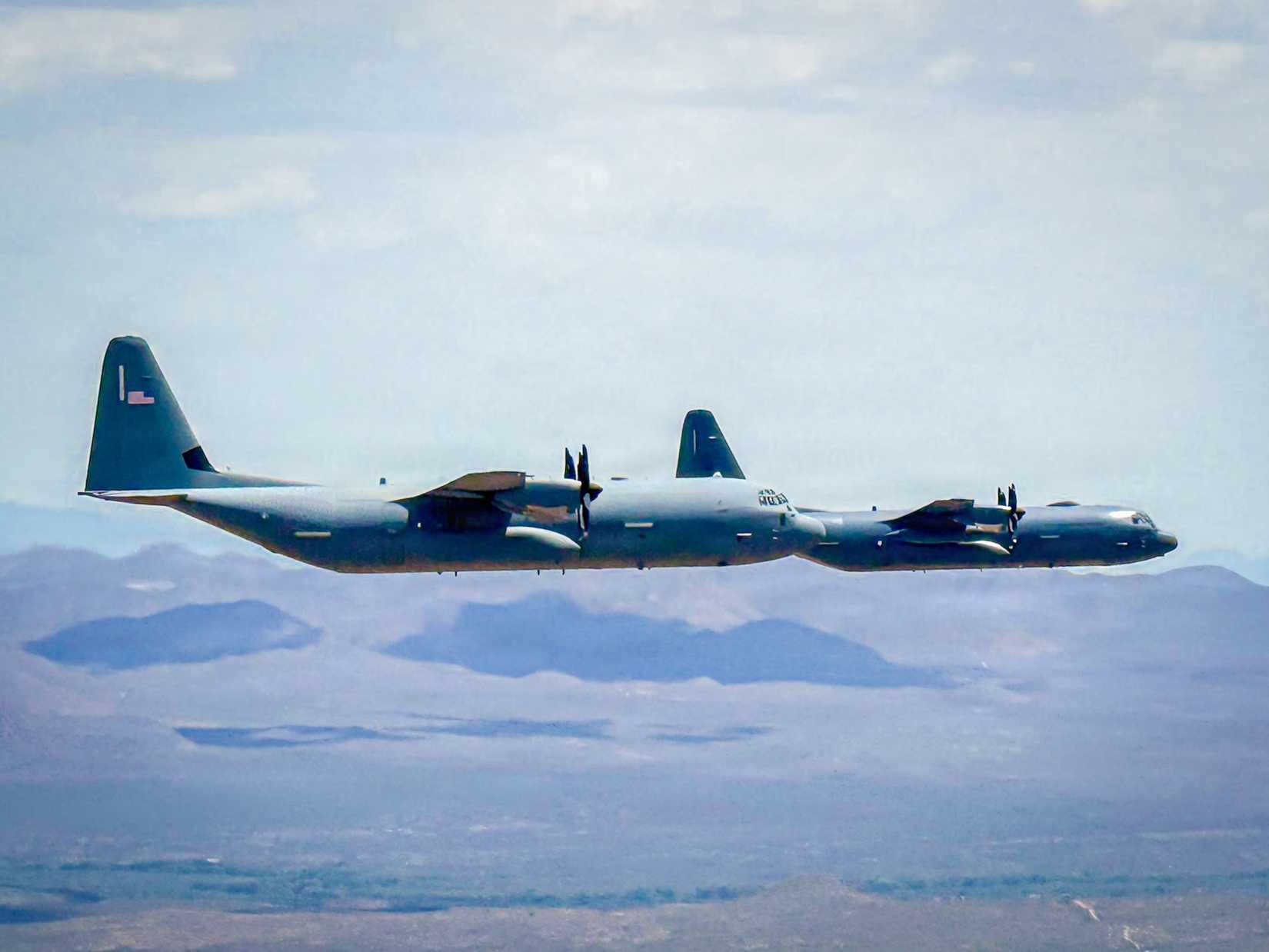 Air Force C-130J Hercules aircraft assigned to the 40th Airlift Squadron, and a Royal New Zealand Air Force C-130J Hercules.