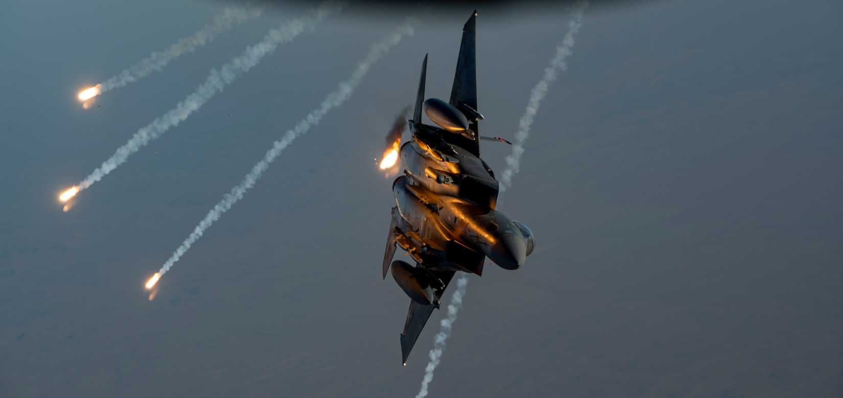 Air Force F-15E Strike Eagle fires flares over the U.S. Central Command area of responsibility, July 17, 2025.