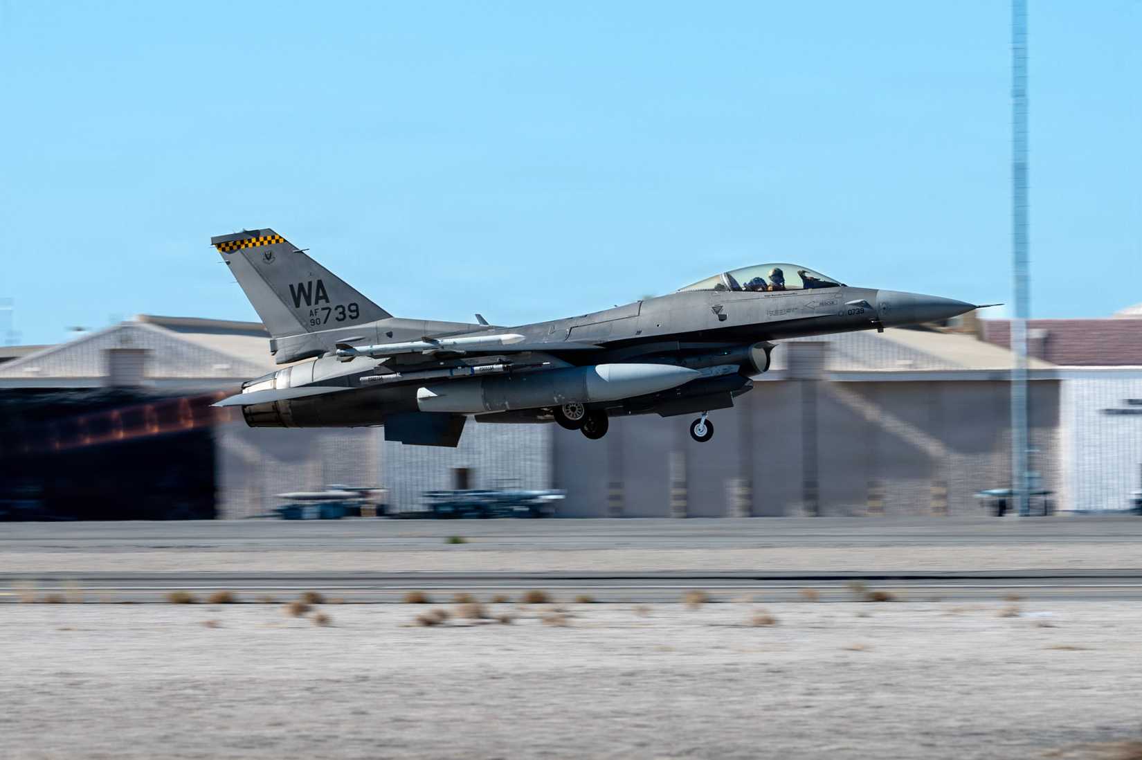 Air Force F-16C Fighting Falcon, assigned to the 64th Aggressor Squadron, takes flight during Red Flag-Nellis.