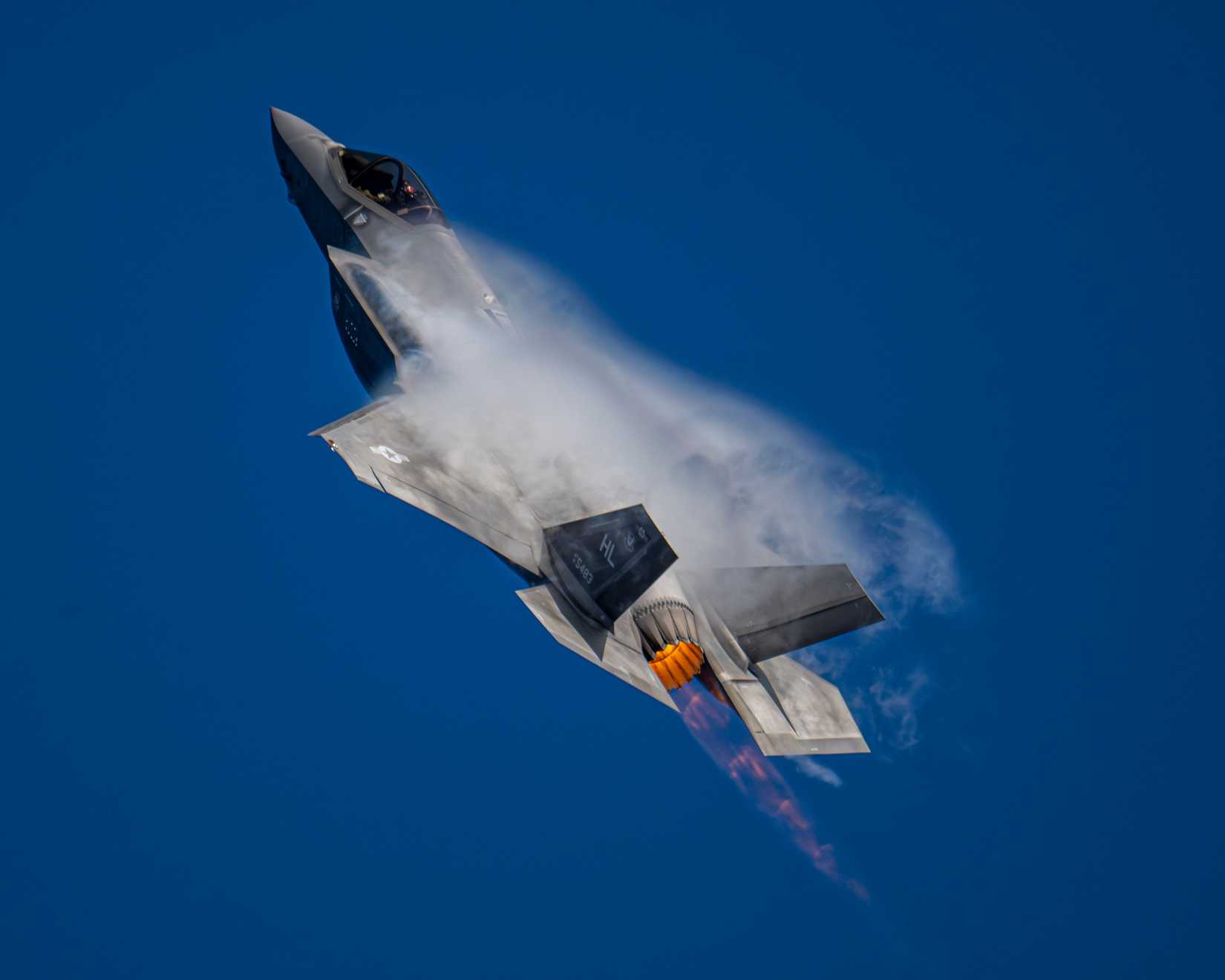 Air Force Maj. Melanie “Mach” Kluesner, pilot for the F-35A Demonstration Team, preforms high-speed aerial maneuvers
