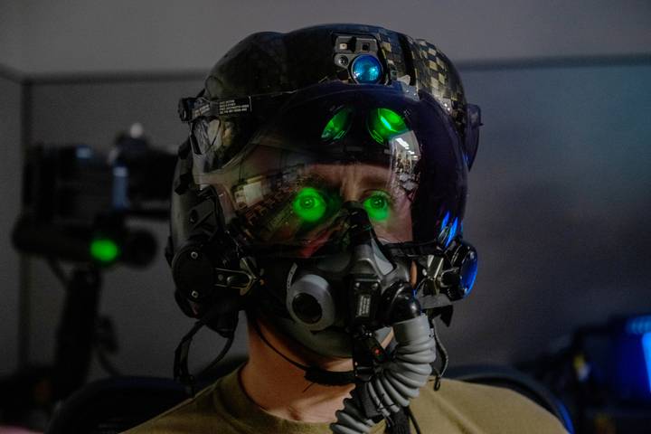 Air Force Tech. Sgt. Anthony Farnsworth, 419th Operations Support Squadron, poses for a photo to demonstrate the F-35 Generation III Helmet-Mounted Display.