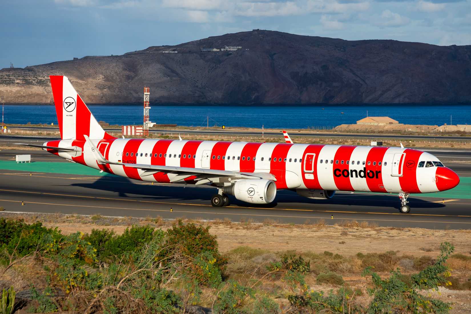 Airbus A321 airliner of Condor Airlines at Gran Canaria Airport, Gando, with red striped livery.