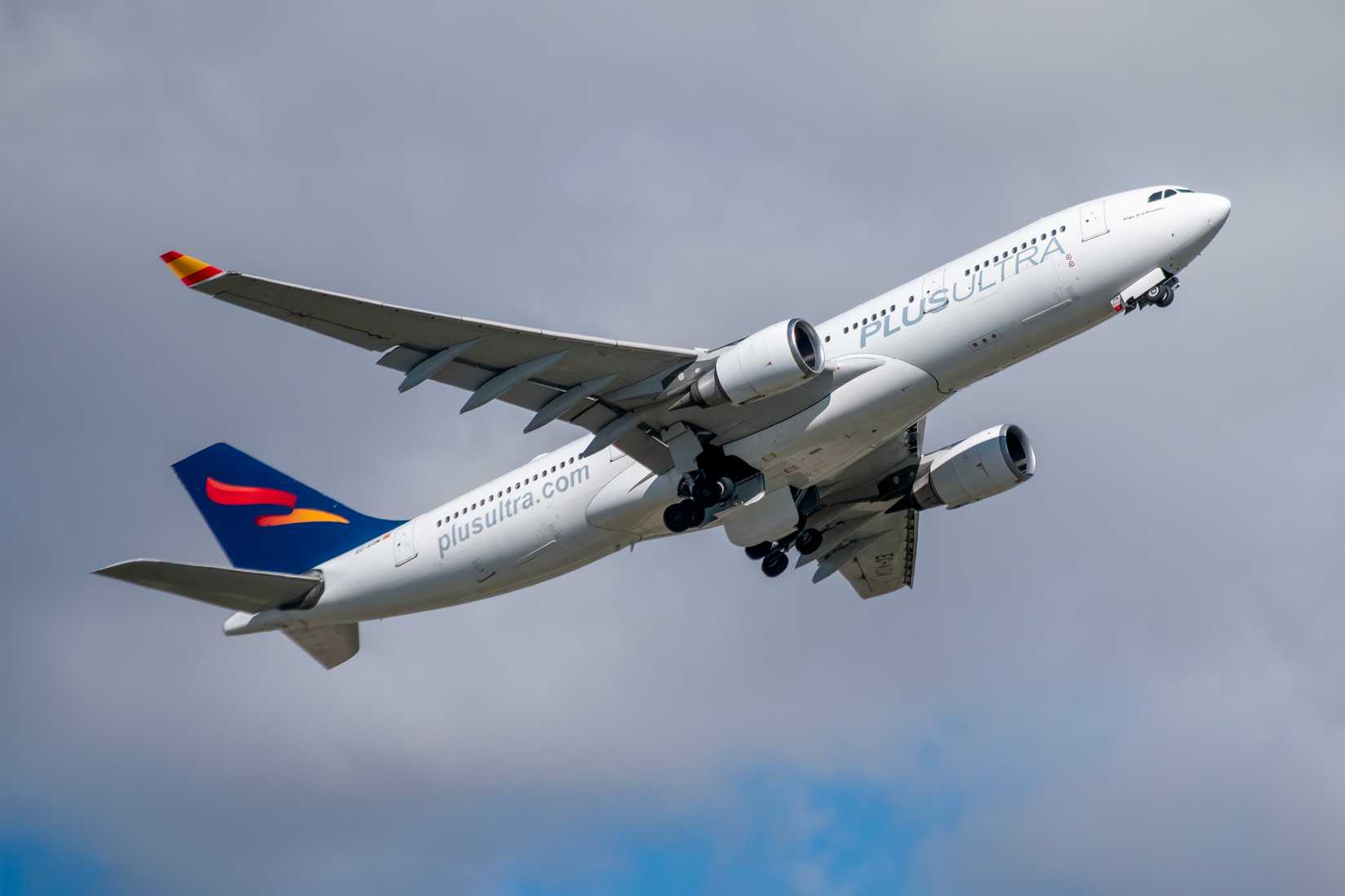 Airbus A330 202 airliner of the Spanish airline Plus Ultra Lineas Aereas taking off at Madrid Barajas airport with registration EC-KOM.