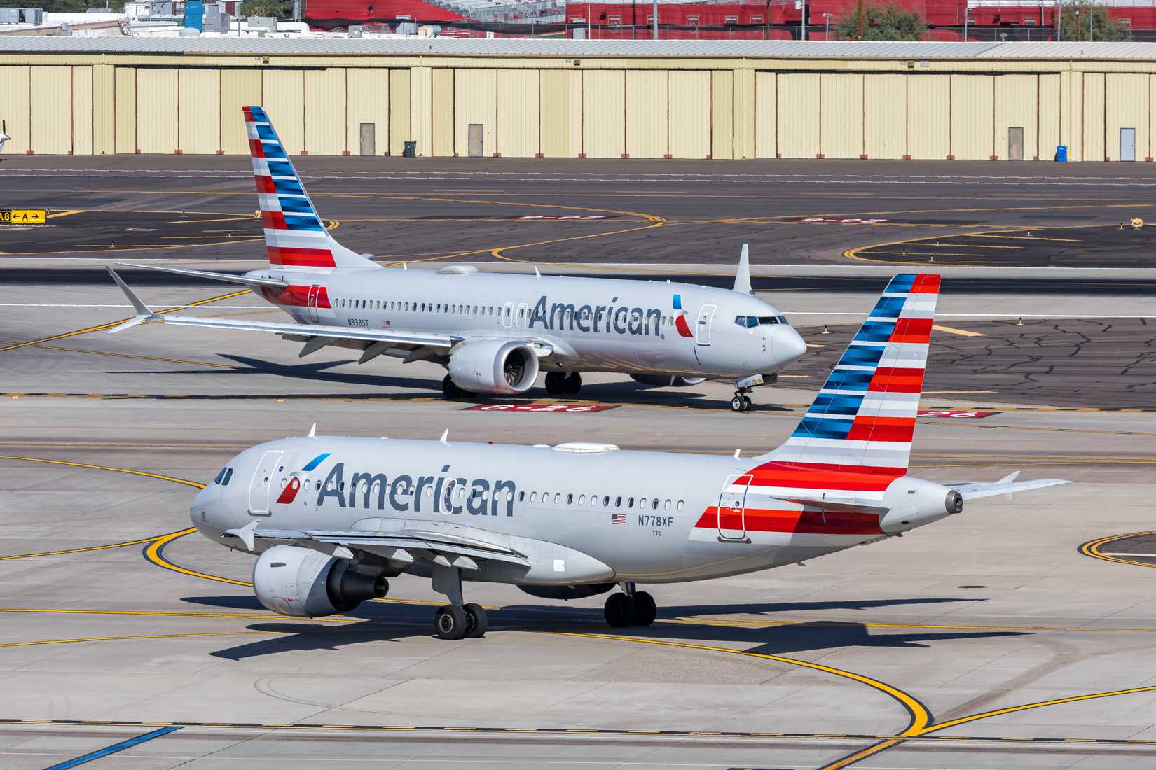 American Airlines Airbus A319 and Boeing 737-8 MAX airplanes at Phoenix airport.