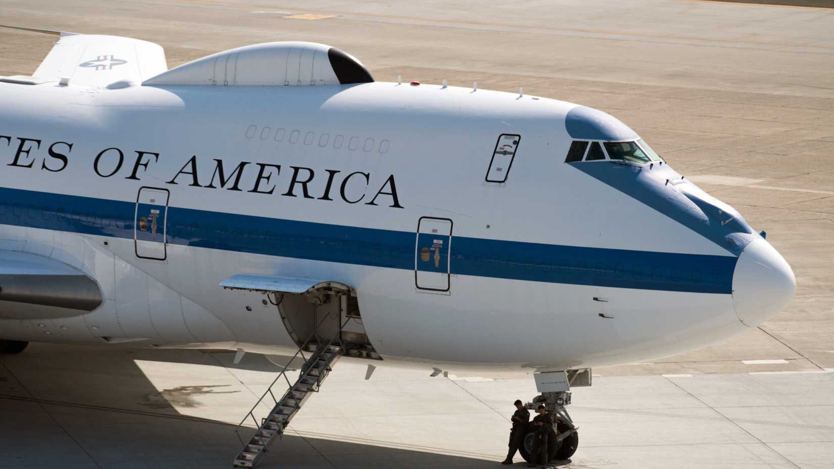 An E-4B aircraft sits on the tarmac at Travis Air Force Base.