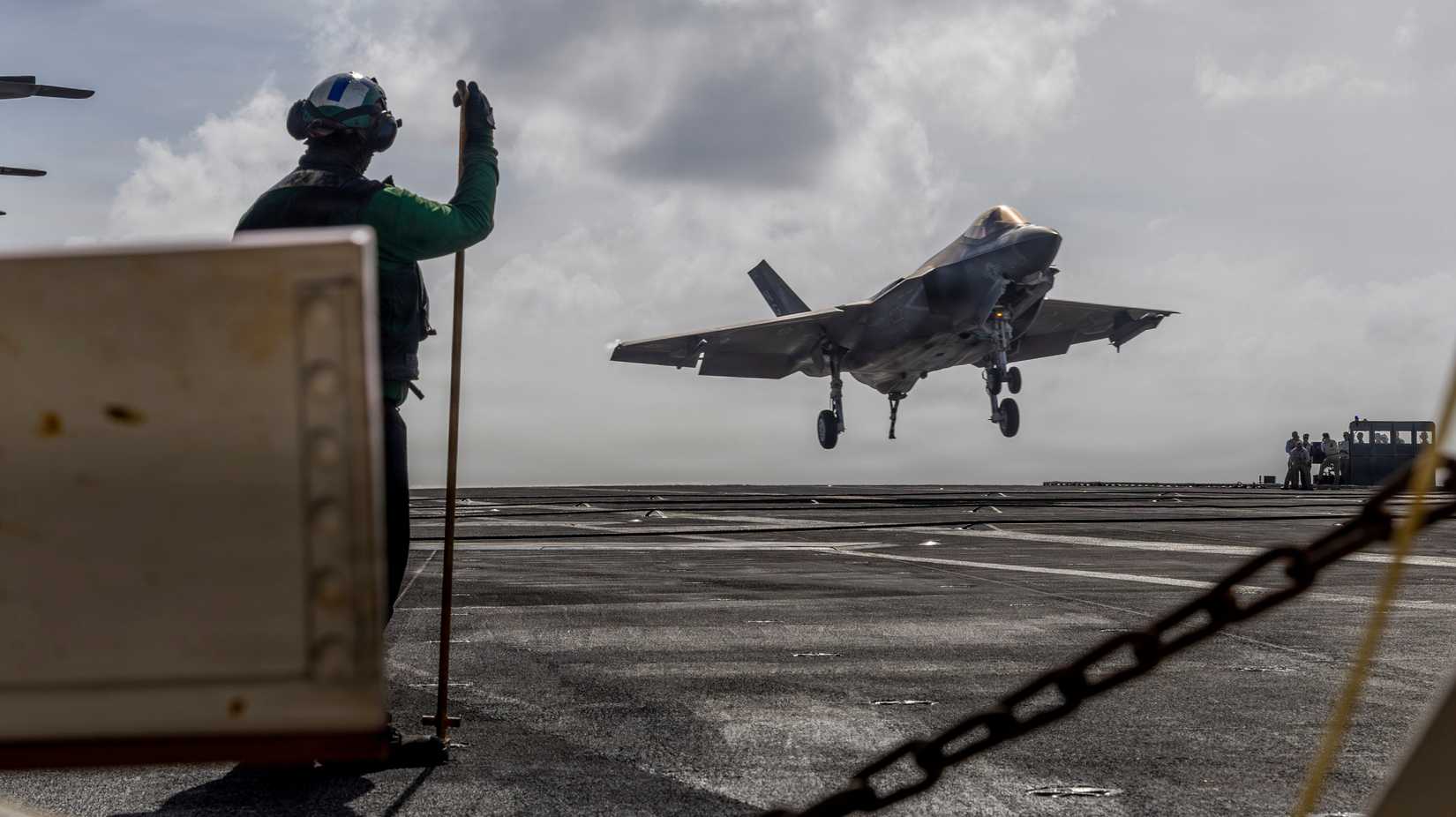 An F-35C Lightning II, attached to Marine Fighter Attack Squadron (VMFA) 314, prepares to make an arrested landing on the flight deck.