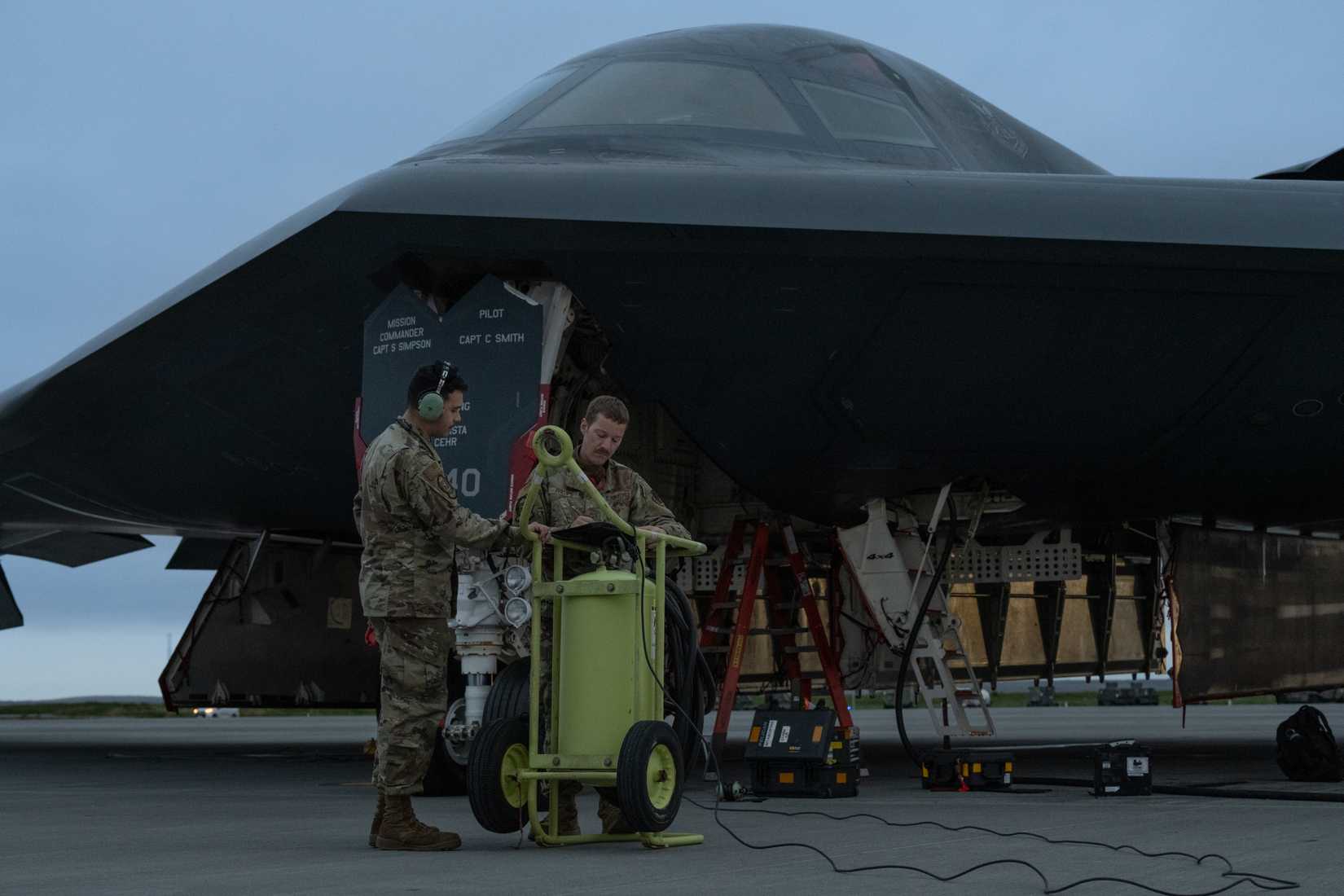 U.S. Air Force maintainers with the 393rd Expeditionary Bomb Squadron perform maintenance on a B-2 Spirit stealth bomber as part of a Bomber Task Force mission supported by the Icelandic Coast Guard at Keflavik Air Base, Iceland,