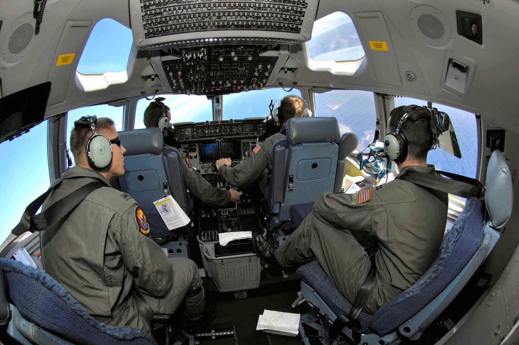 Pilots from the 535th Airlift Squadron from Hickam Air Force Base, Hawaii, fly their C-17 Globemaster III during a local training mission
