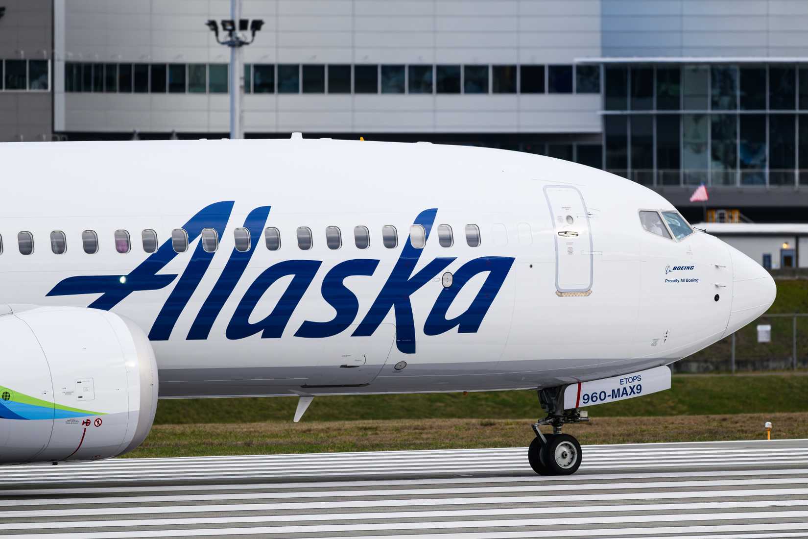 Closeup of Alaska Airlines Boeing 737 MAX 9 N960AK aircraft on runway