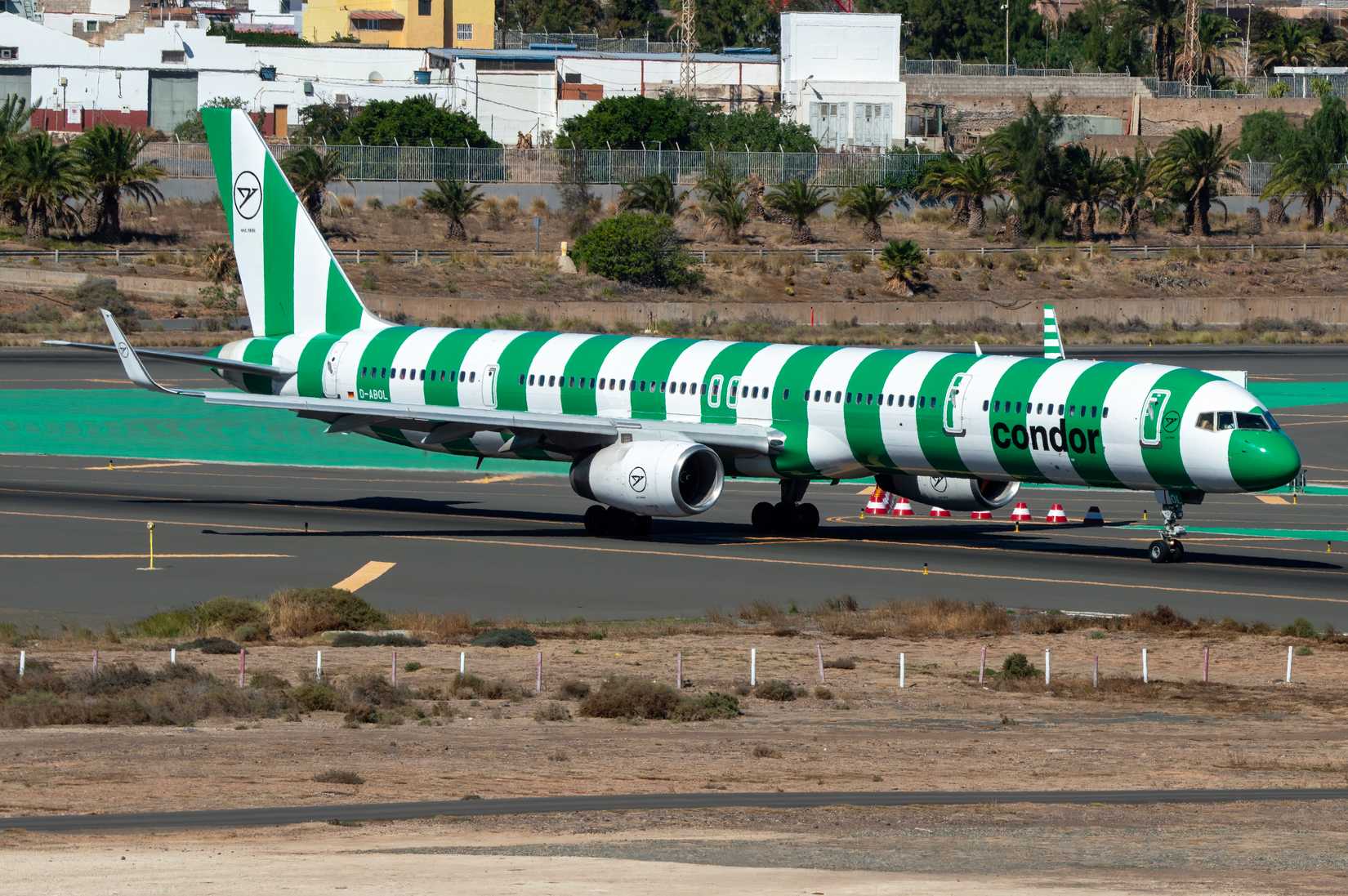 Condor airline Boeing 757 airliner with special green stripe livery at Gran Canaria airport.