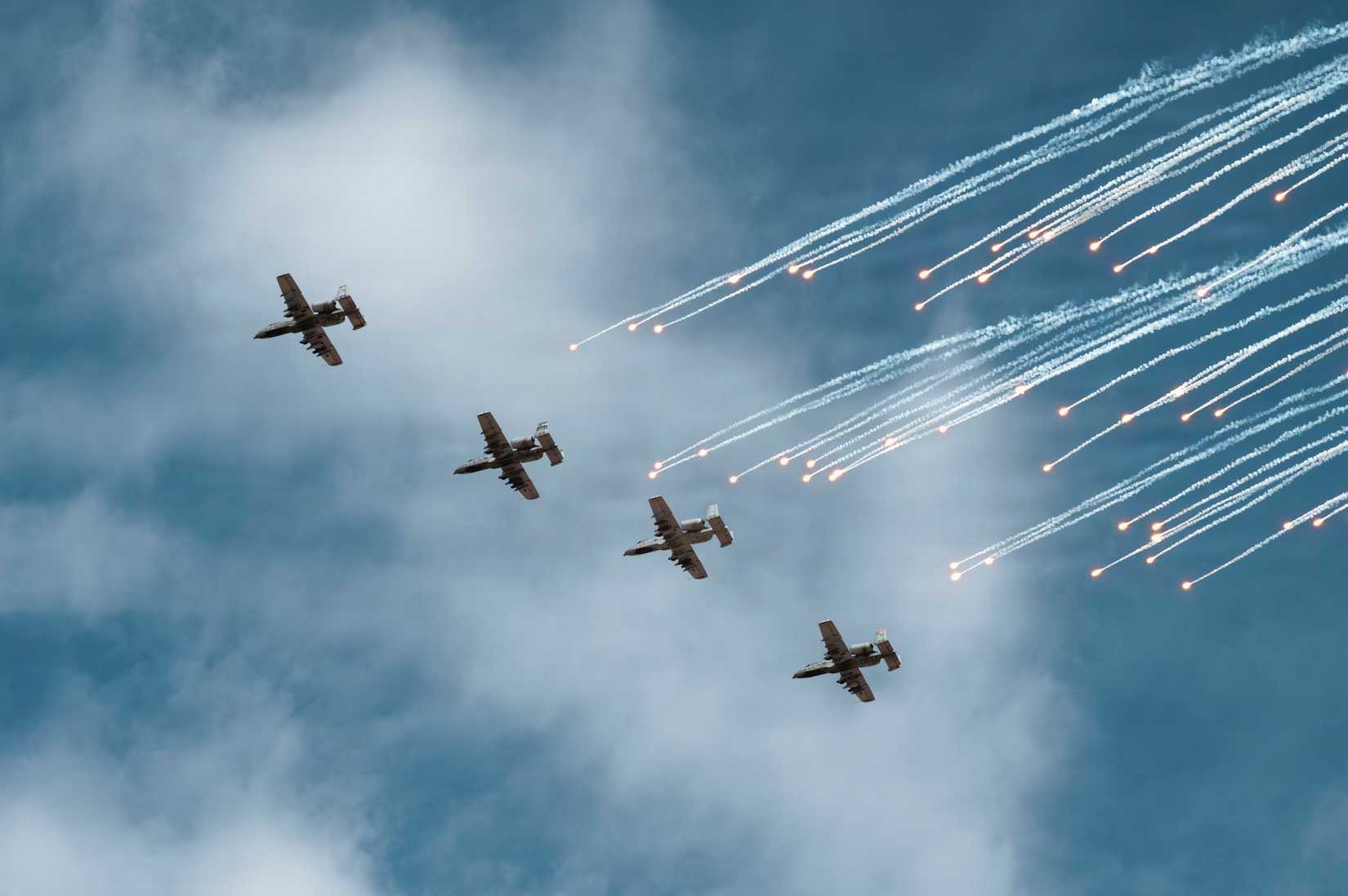 Four U.S. Air Force A-10C Thunderbolt II aircraft assigned to the 357th Fighter Generation fly in formation.