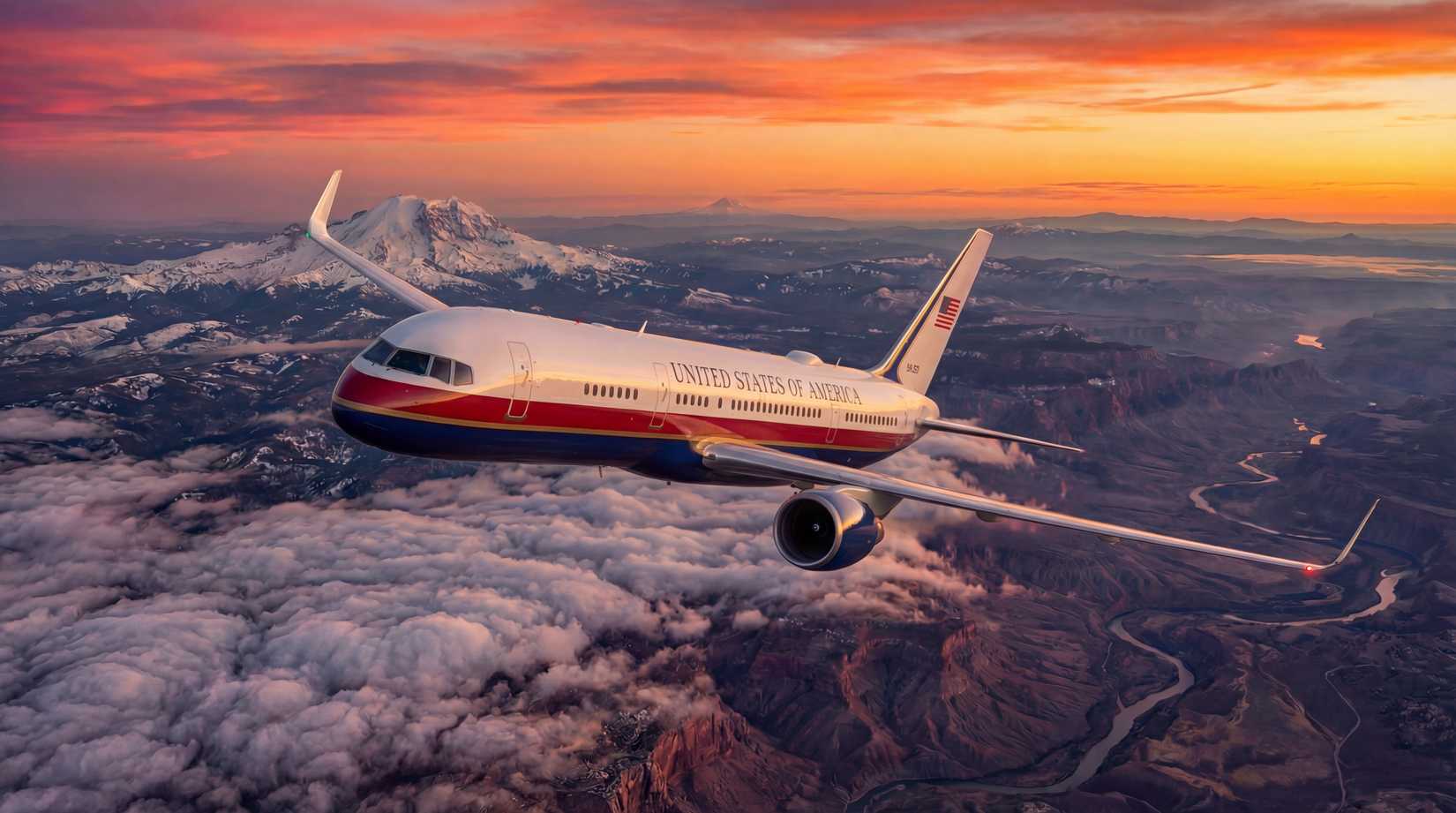An aerial view of a "United States of America" aircraft flying over a vast landscape of snow-capped mountains and a winding river canyon at sunset. The sky is filled with vibrant orange and pink clouds.