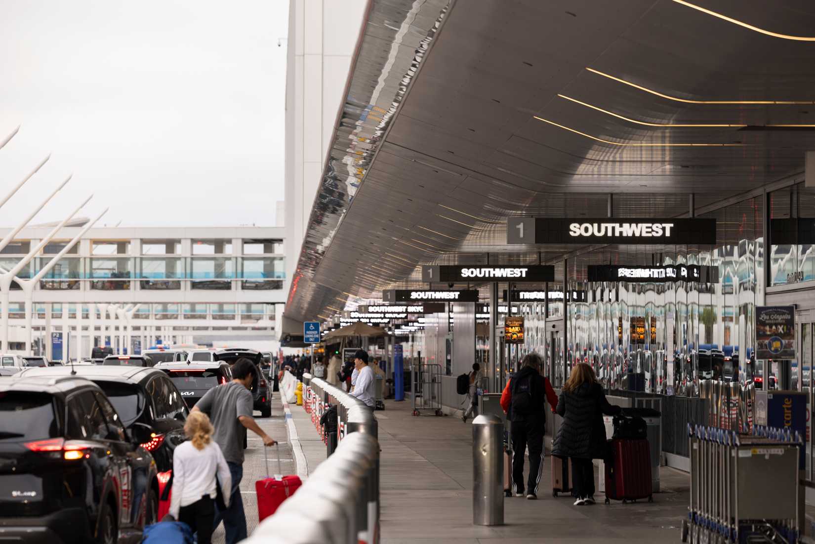 LAX airport pedestrian travelers and traffic converge on Southwest's Terminal 1.