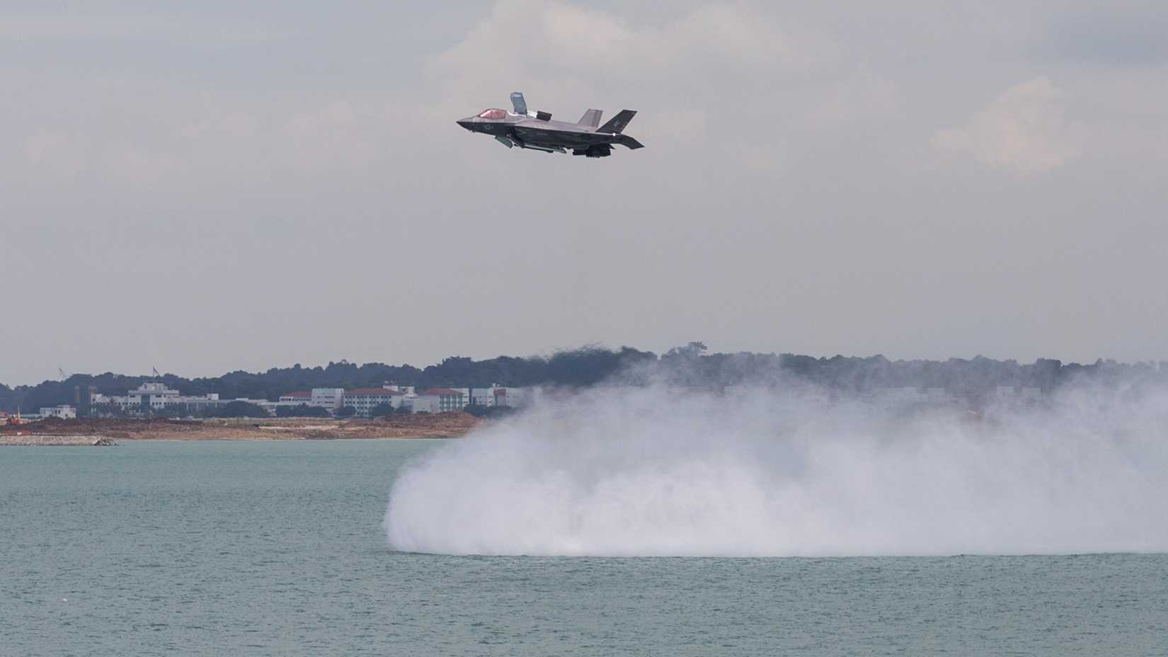 Marine Corps F-35B Lightning II with Marine Fighter Attack Squadron 242 hovers during an aerial demonstration at the Singapore Airshow.
