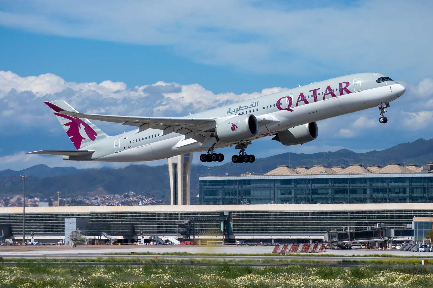 Qatar Airways Airbus A350 taking off from Malaga Costa del Sol Airport.