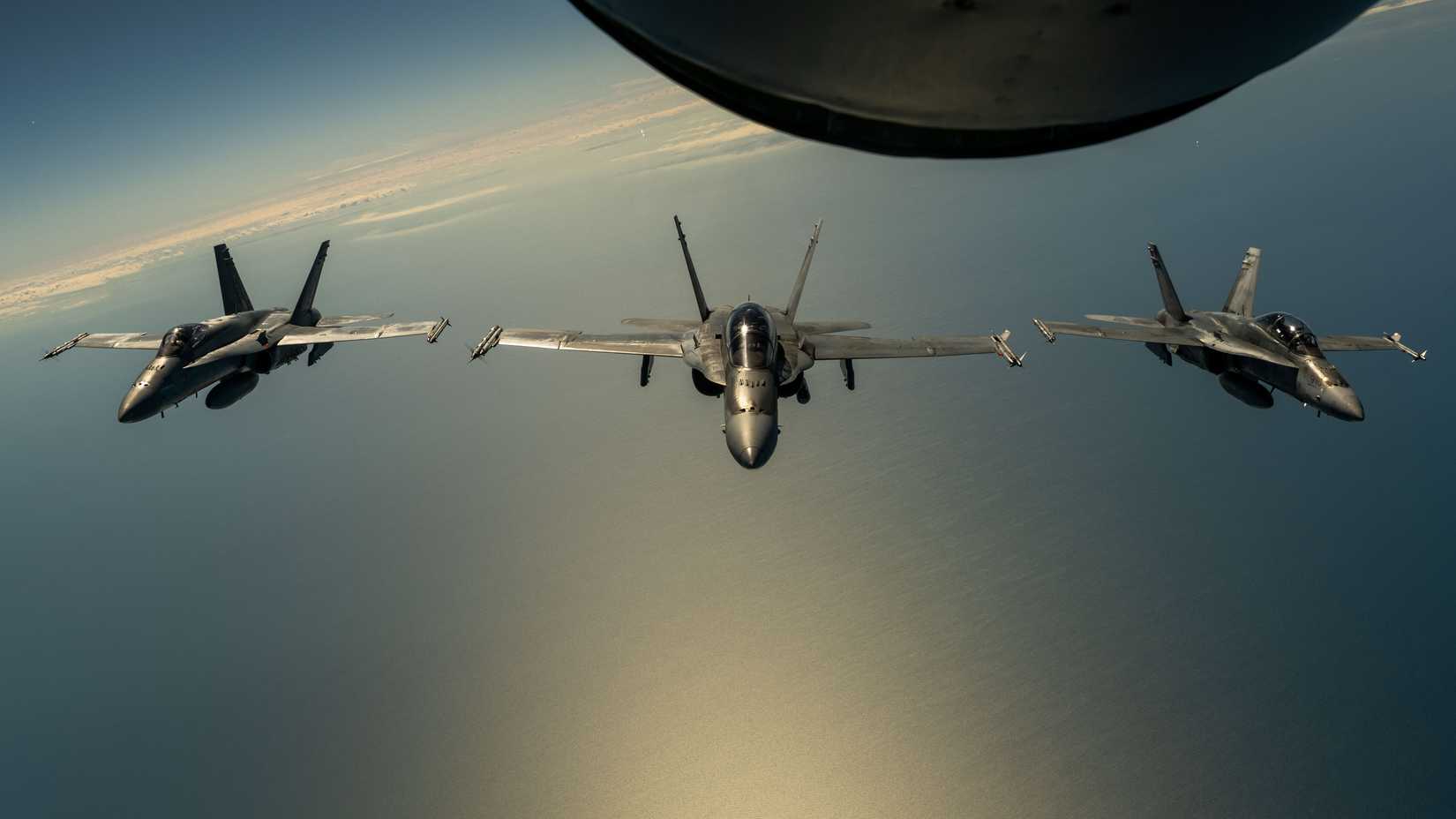 Royal Canadian Air Force CF-18A Hornets assigned to the 410th Tactical Fighter Squadron fly in formation.