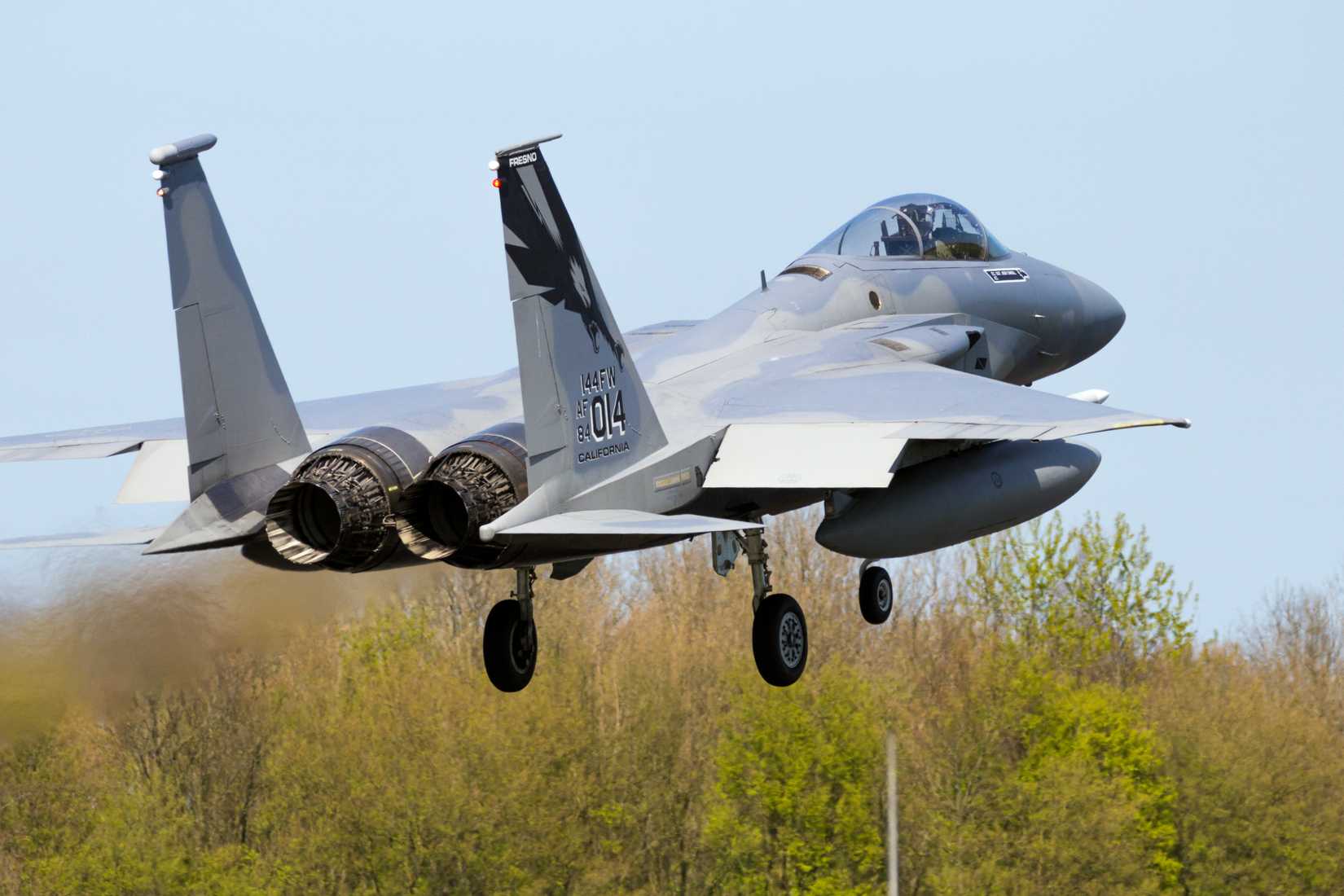 144th Fighter Wing California Air National Guard F-15C Eagle fighter jet plane landing on Leeuwarden Air Base during exercise Frisian Flag
