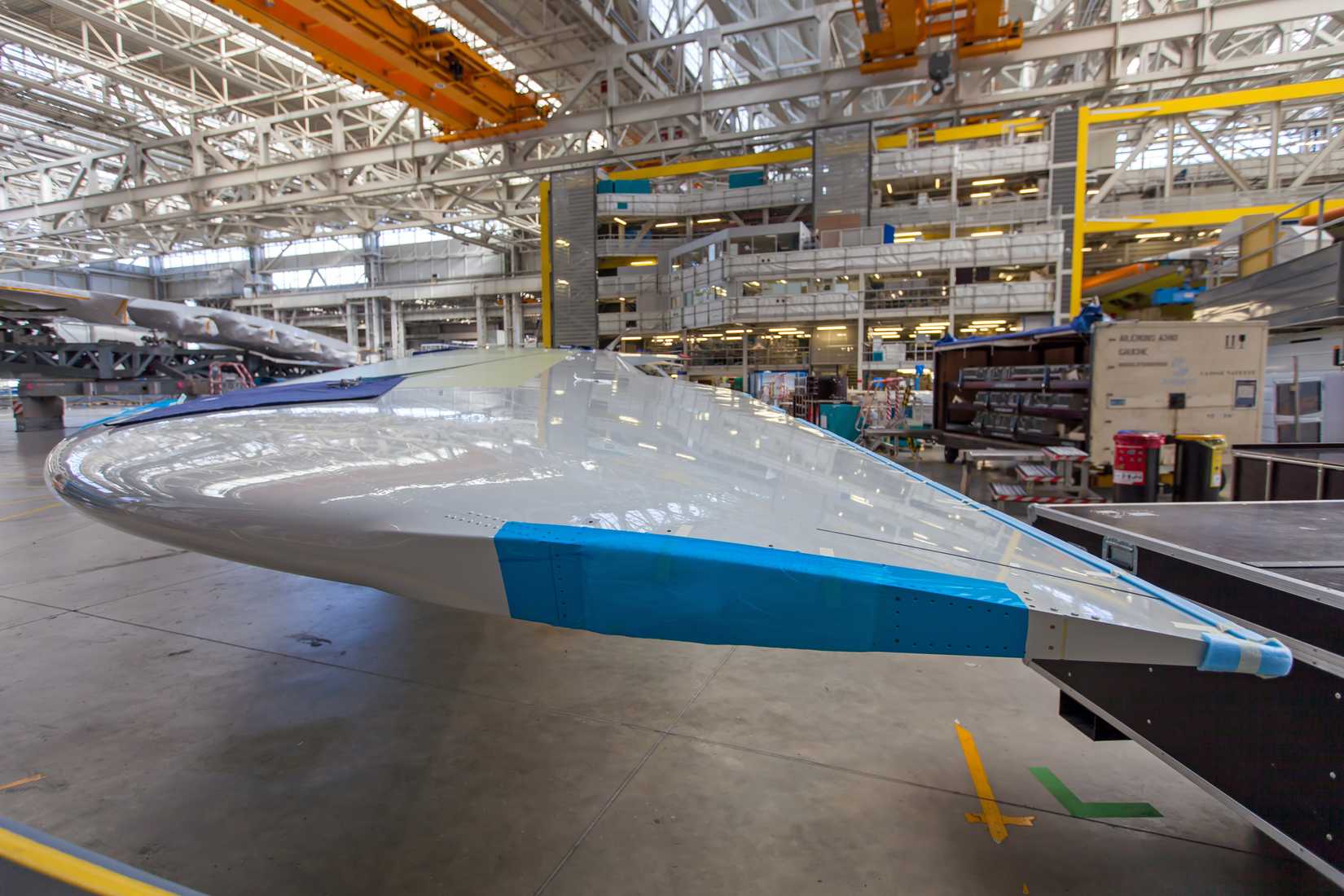 An Airbus Wing Inside A Plant