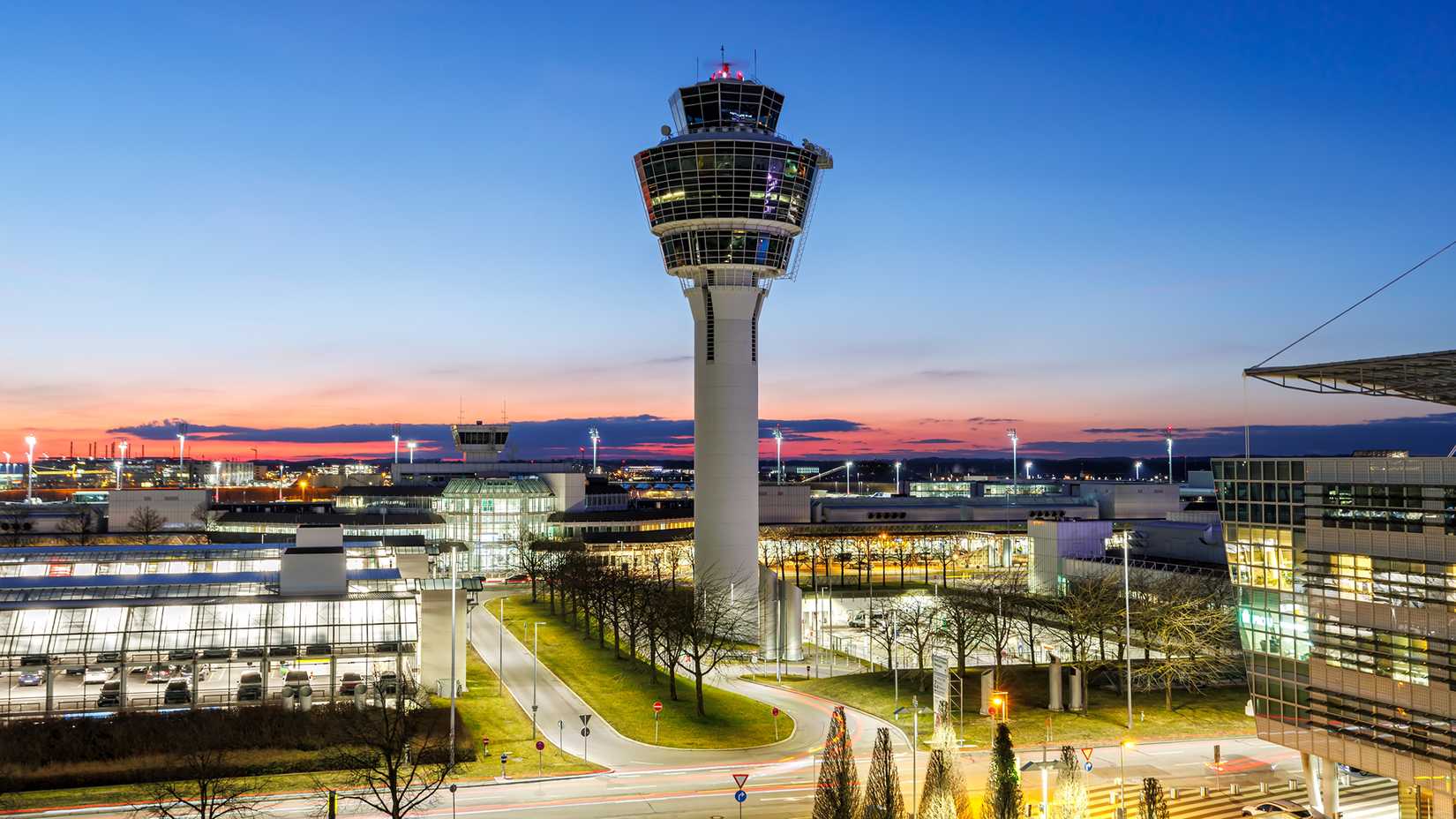 munich airport tower at night