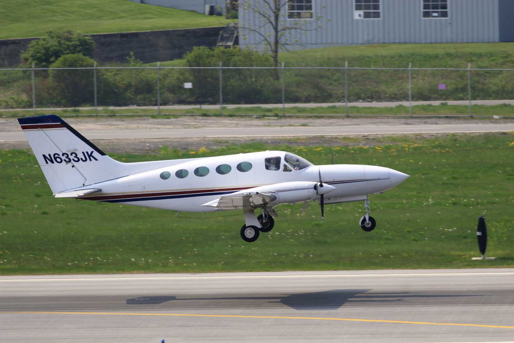 Cessna 414 Taking Off