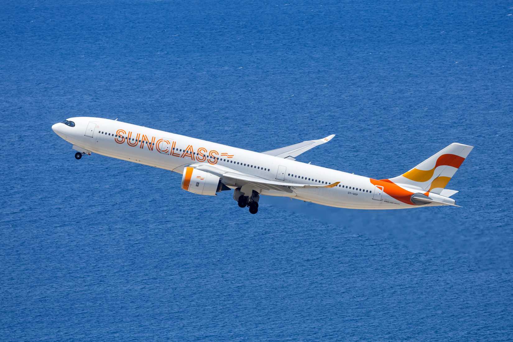 Sunclass Airlines Airbus A330-900neo airplane at Rhodes airport in Greece.