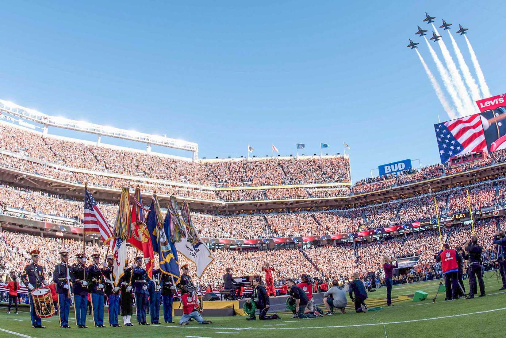 The Navy Blue Angels perform a flyover concluding the opening ceremony of Super Bowl 50 at Levi's Stadium in Santa Clara, Calif., Feb. 7, 2016. The Joint Armed Forces Choir performed during the opening ceremony and the Joint Armed Forces Color Guard presented the Colors. Army Photo by Spc. Brandon C. Dyer