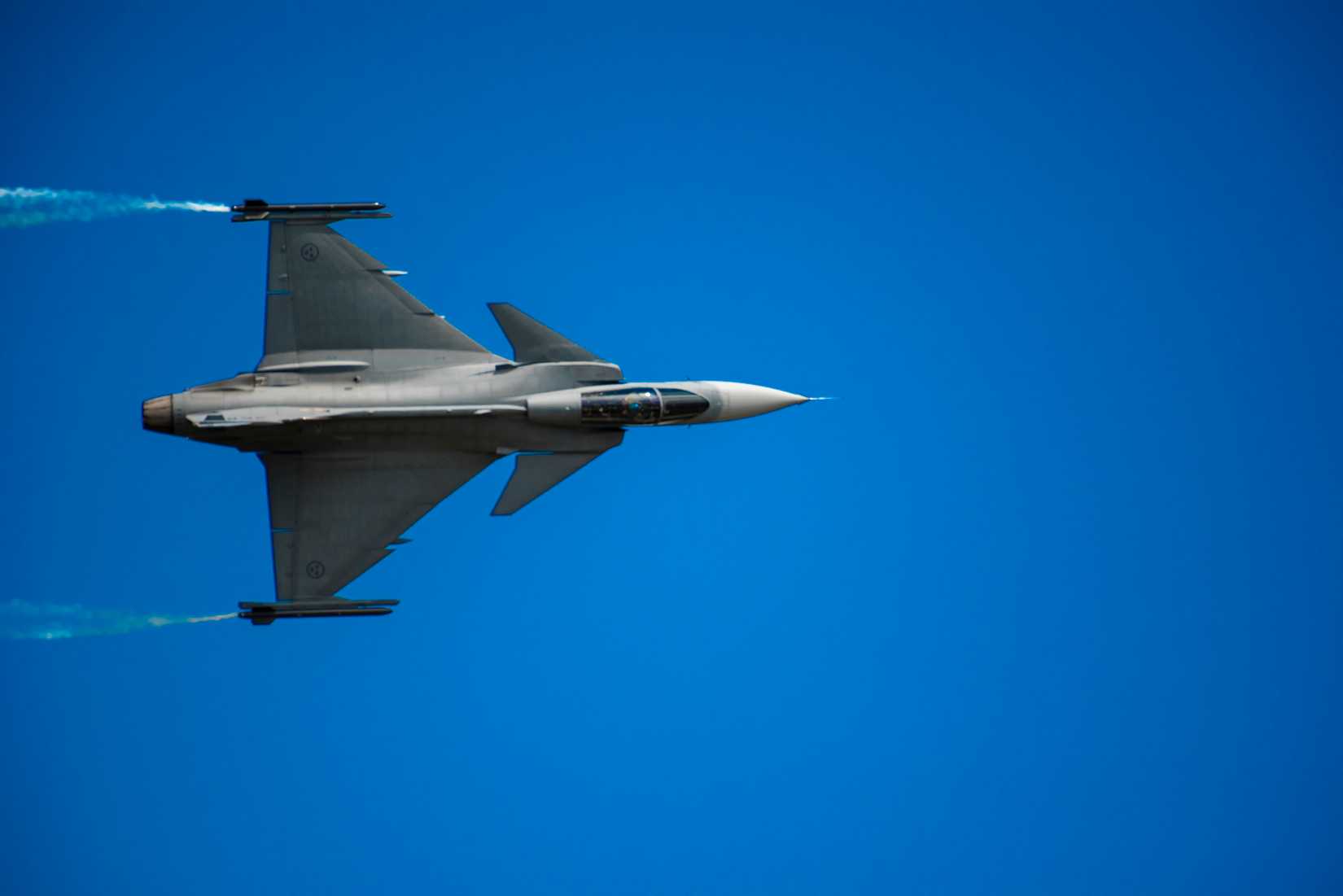 Swedish Air Force Saab JAS 39 Gripen flies past the audience during the 2019 Royal International Air Tattoo.