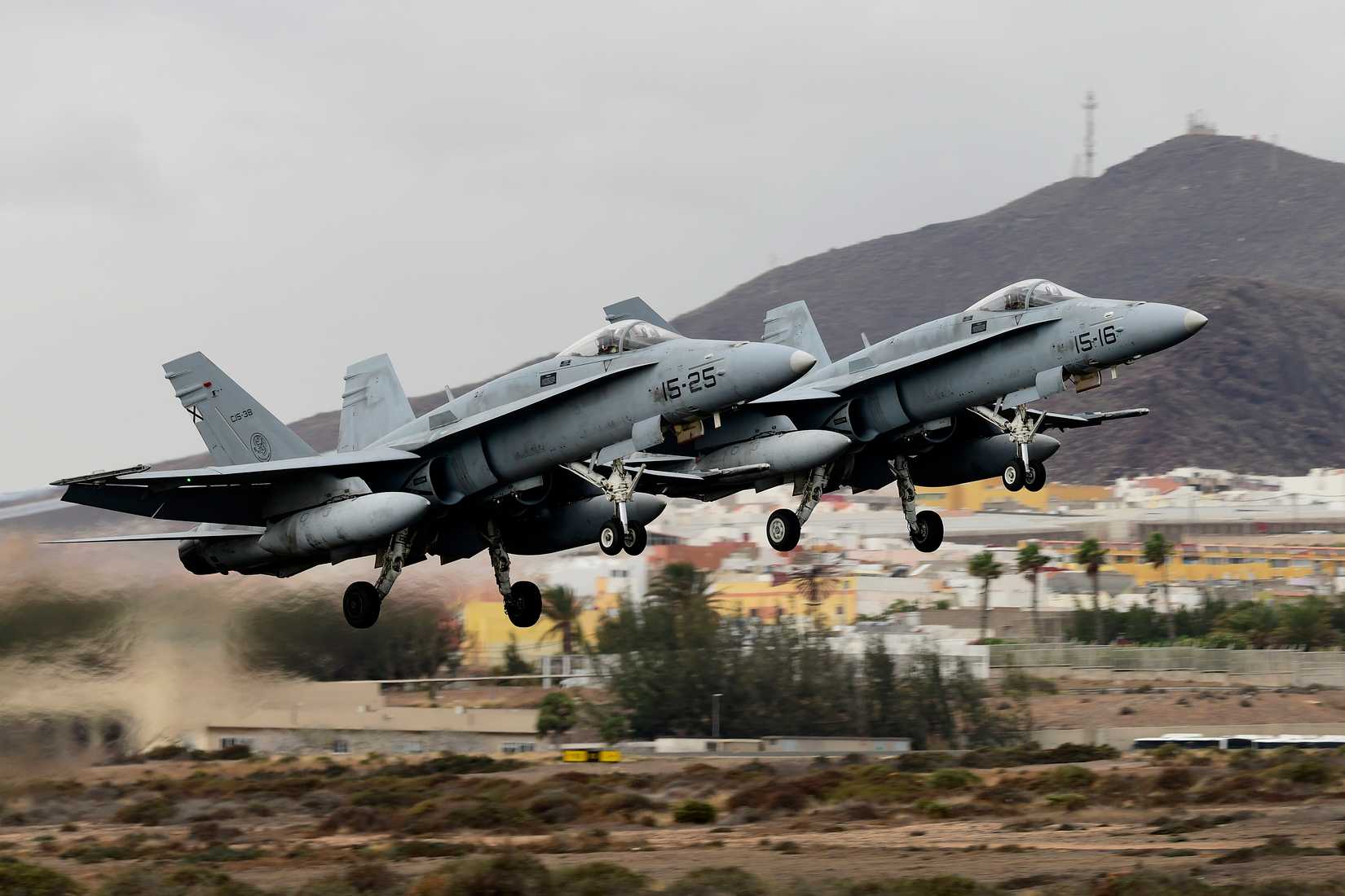 Two Spanish air force FA-18 Hornets launch for a sortie at Gando Air Base