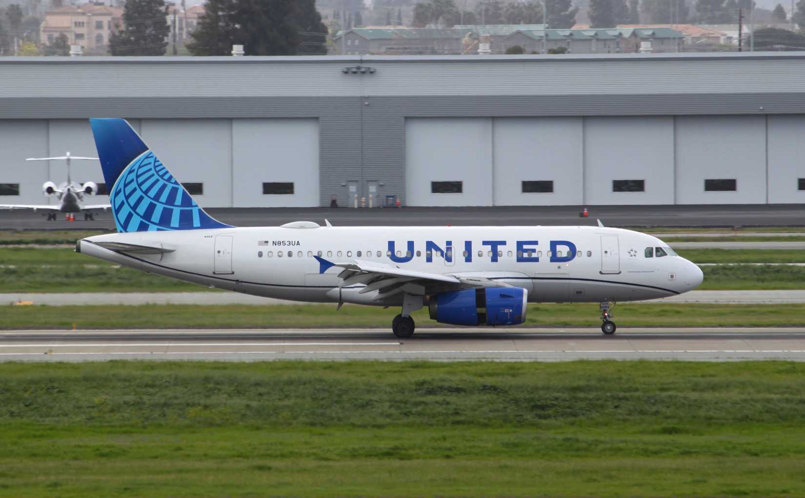 United Airlines A319 landing on the runway