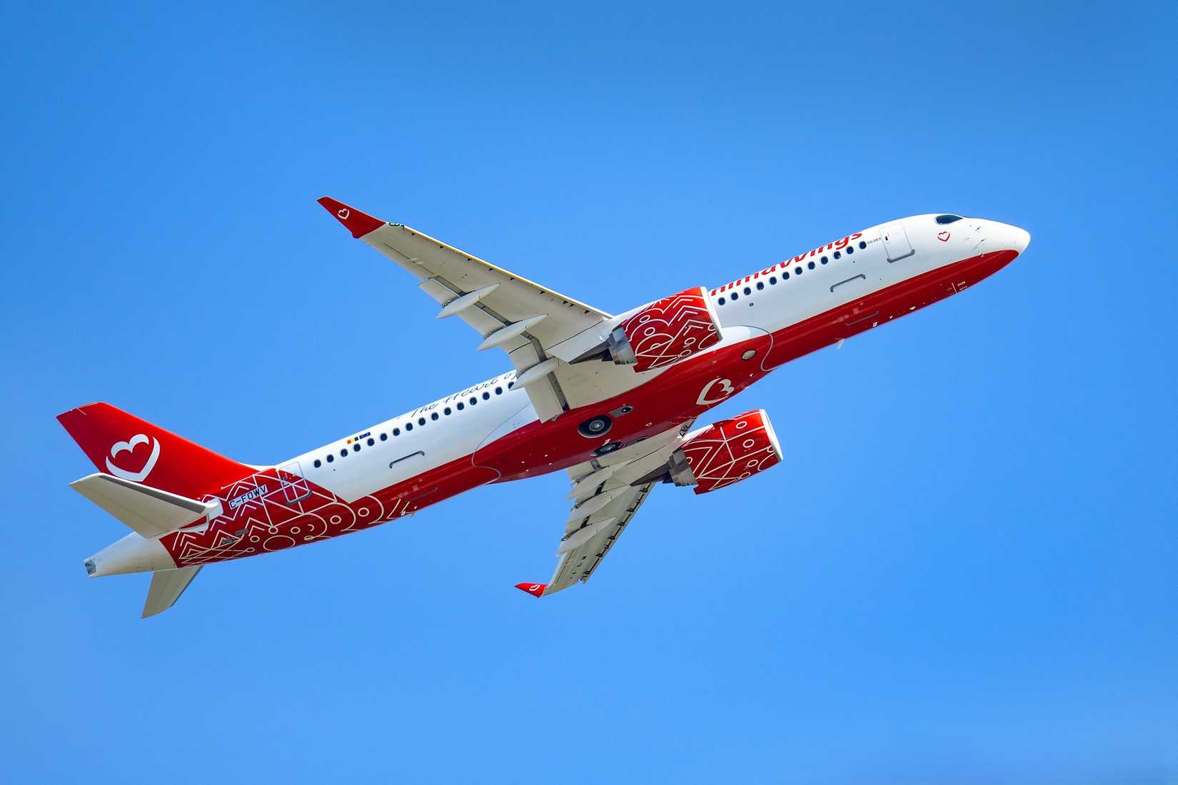 AnimaWings Airbus A220-300 taking off with blue sky